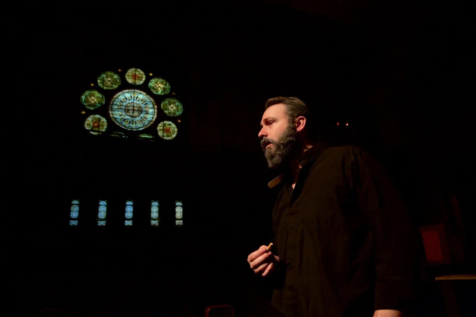 REFUGE priest and stained glass.jpg