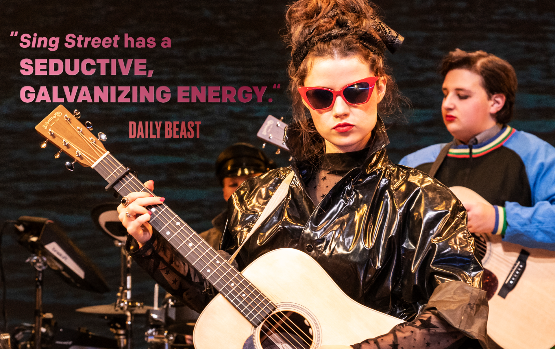 SING STREET girl in red sunglasses.png