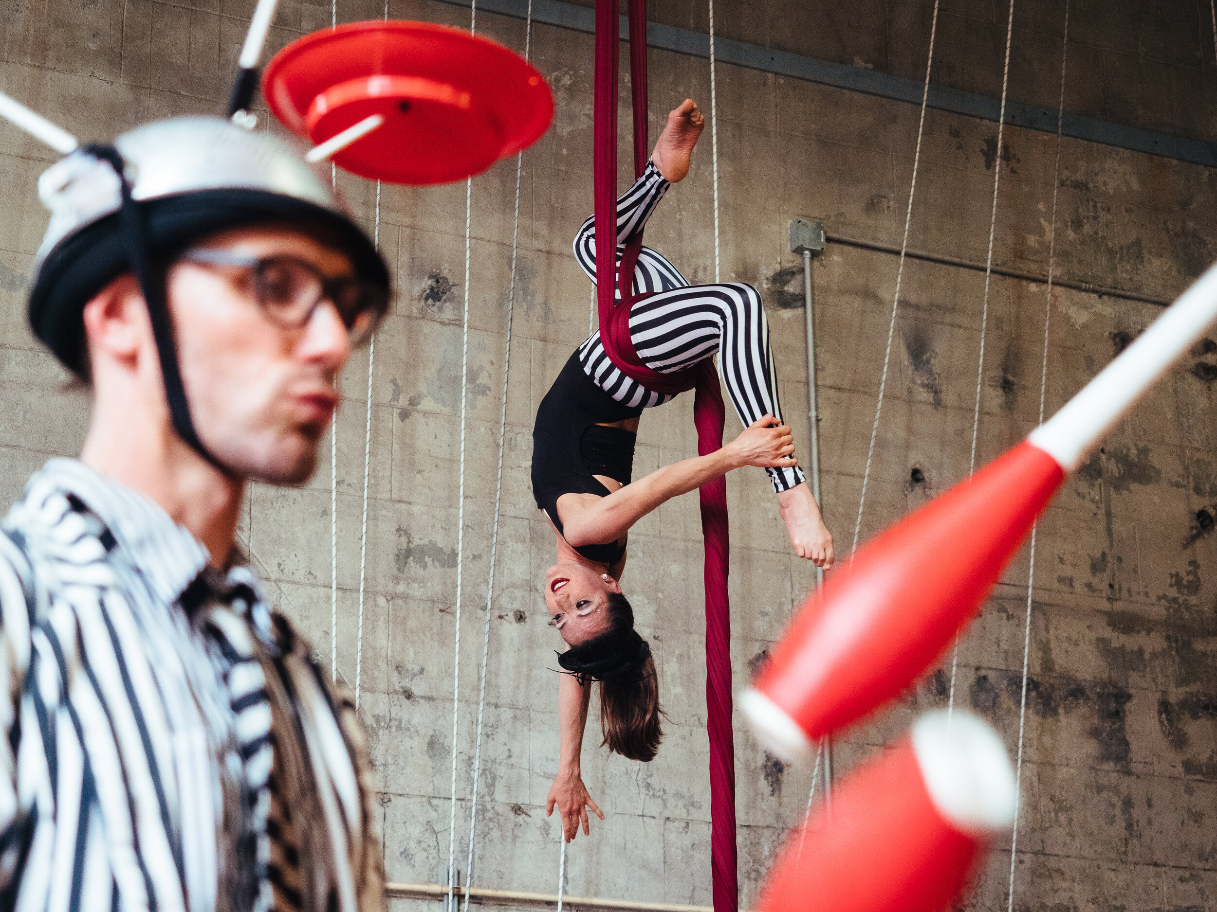  O’Ryan McGowan- Arrowroot, also known as O’Ryan the O’Mazing, juggles as aerialist Kelsey Keller performs in the Iron City Circus Arts on Sunday, June 2, 2019. 