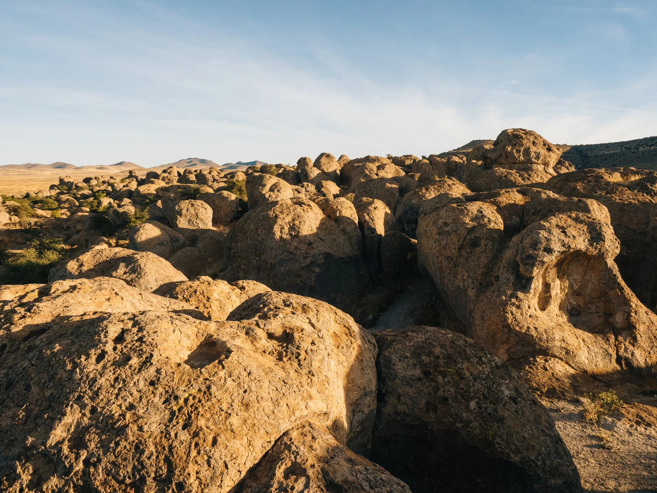   Early morning light shines down on a field of boulders at City of Rocks State Park.  