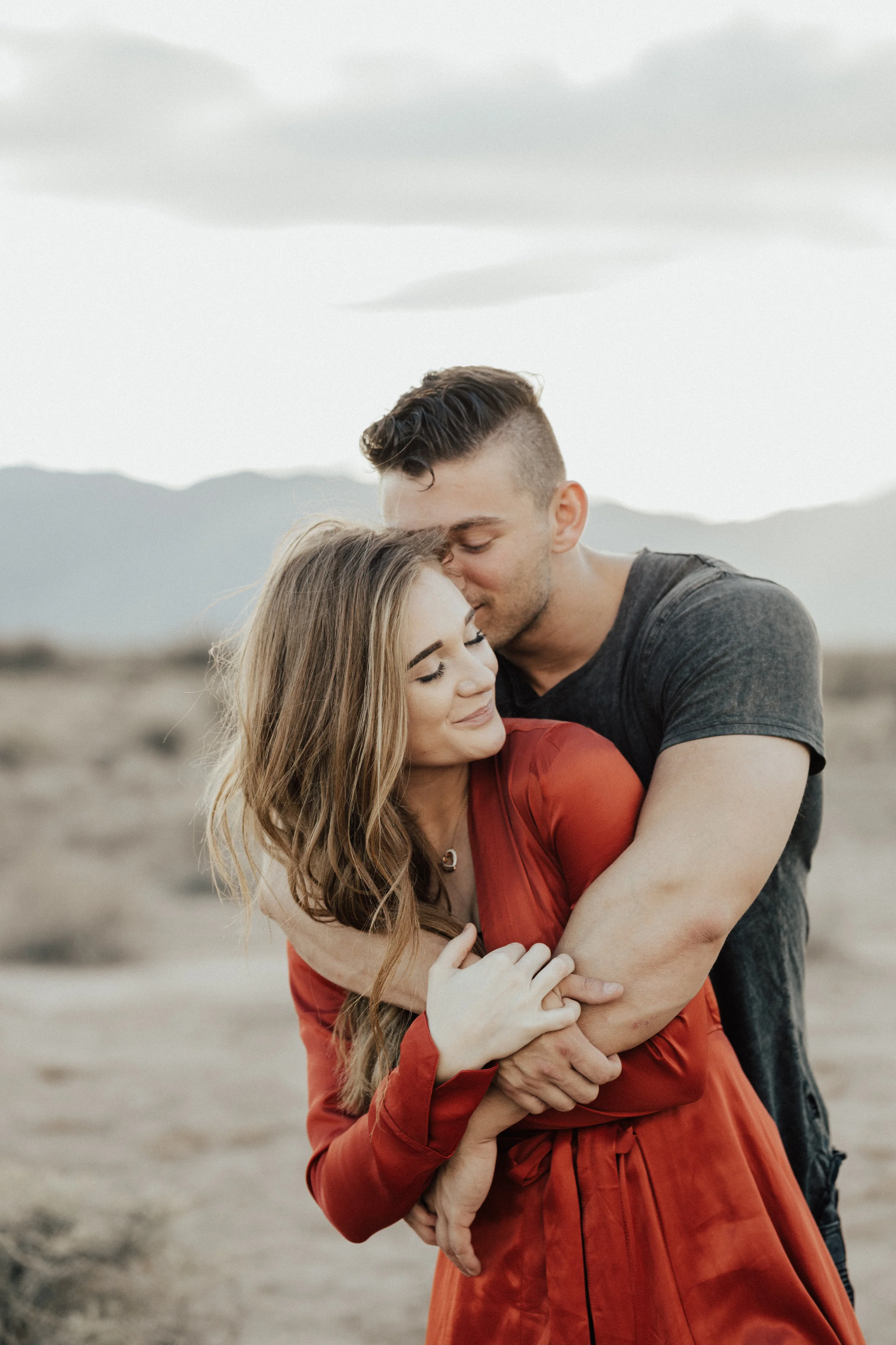For this photo I told him to hug her from behind and blow raspberries on her cheek. I always try to get some natural laughter because I am not a fan of fake laughter. 