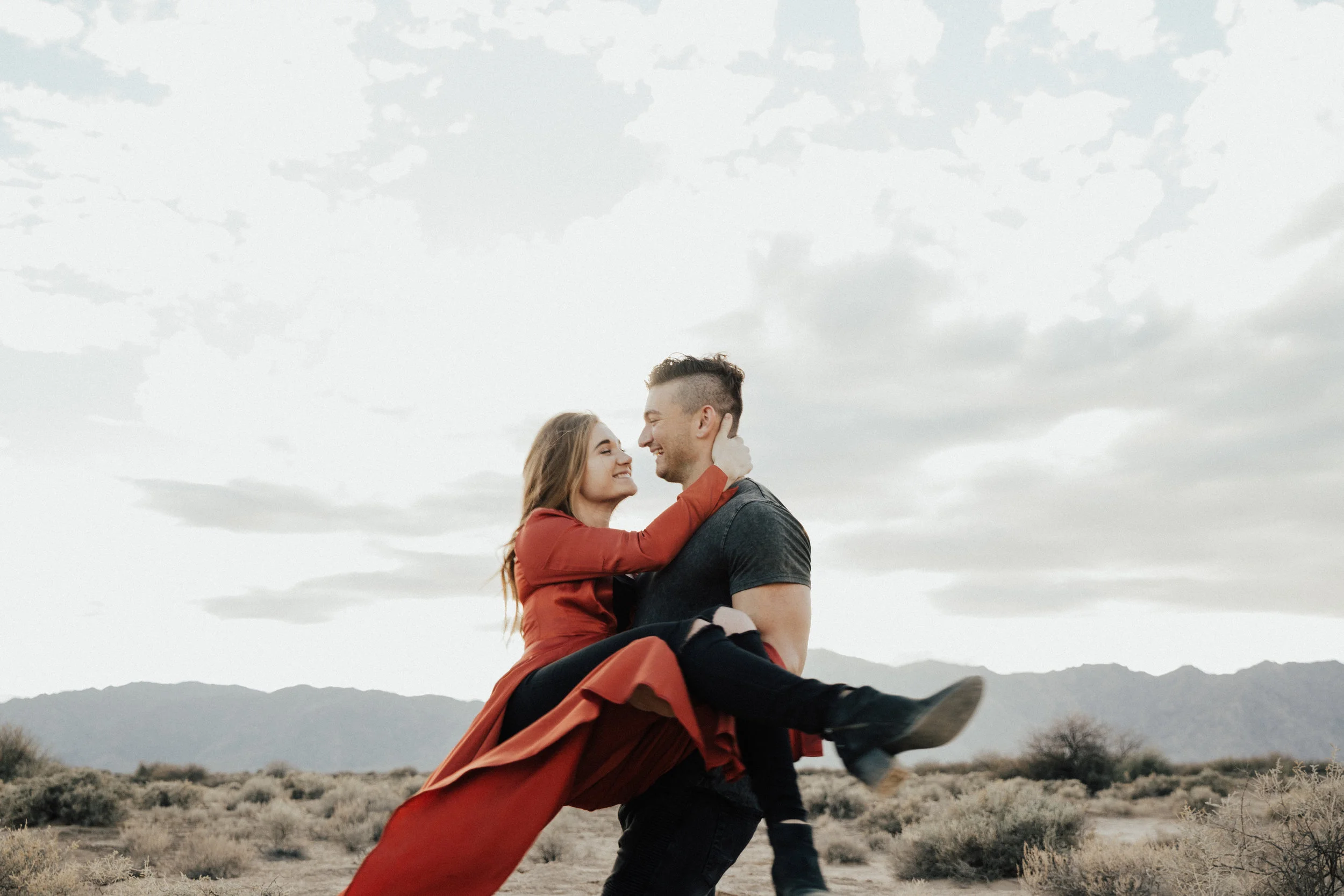 This one is more simple, just pick her up and spin her around. As the photographer you just choose the angle you most want for the artistic look you are going for. 
