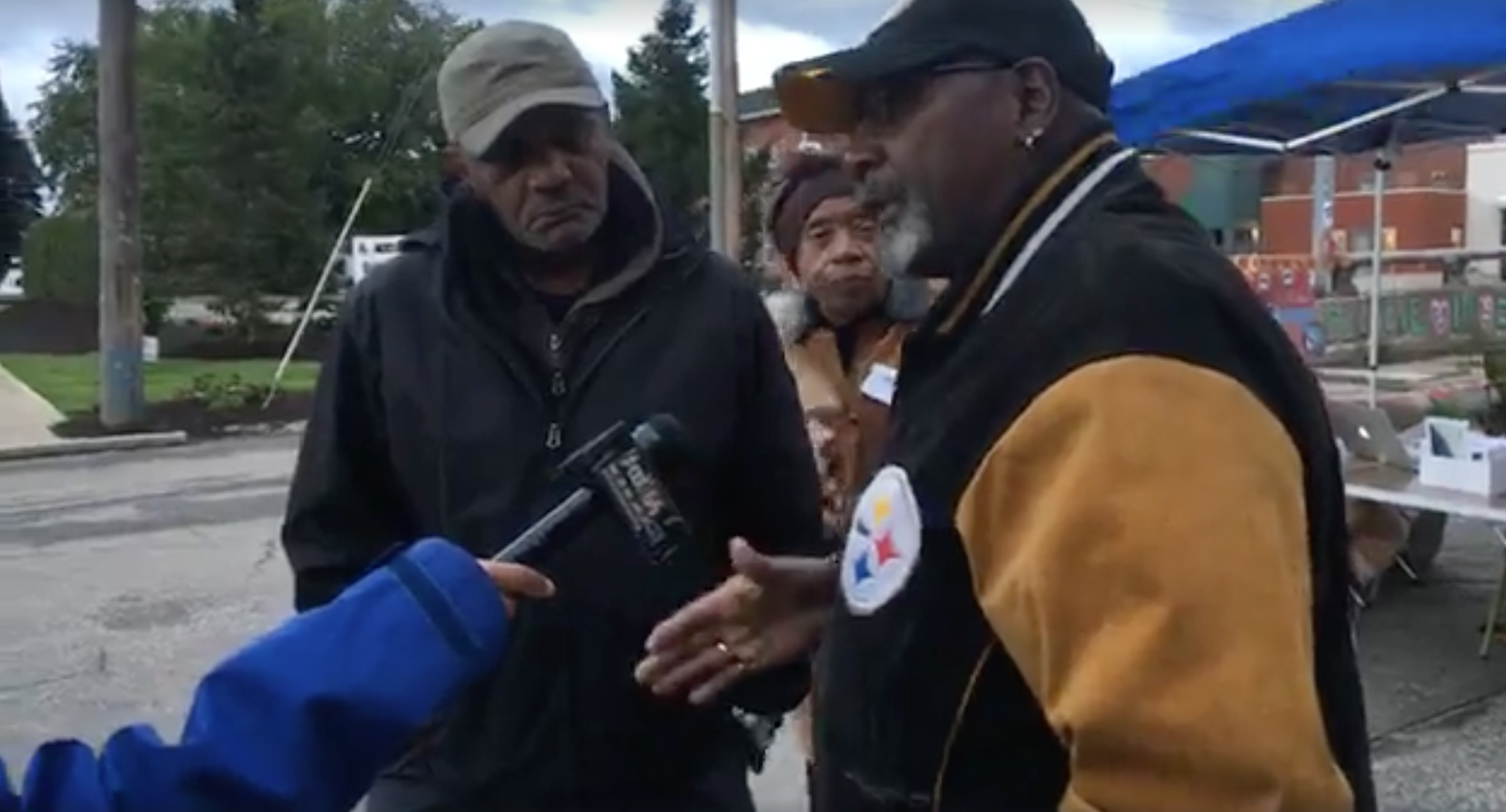 ErieCPR VP John Henderson, ErieCPR Community Outreach Cynthia Muhammad, and ErieCPR Past VP Beary Clark speak to YourErie reporter Tiarra Braddock as tonights Sunset Supper begins.