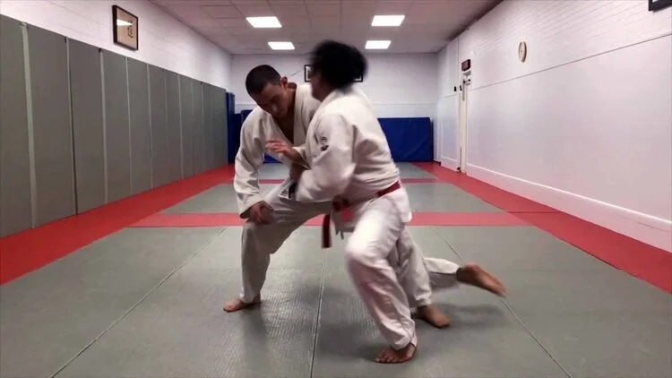 Sumi-Gaeshi Feint into Ouchi-Gari