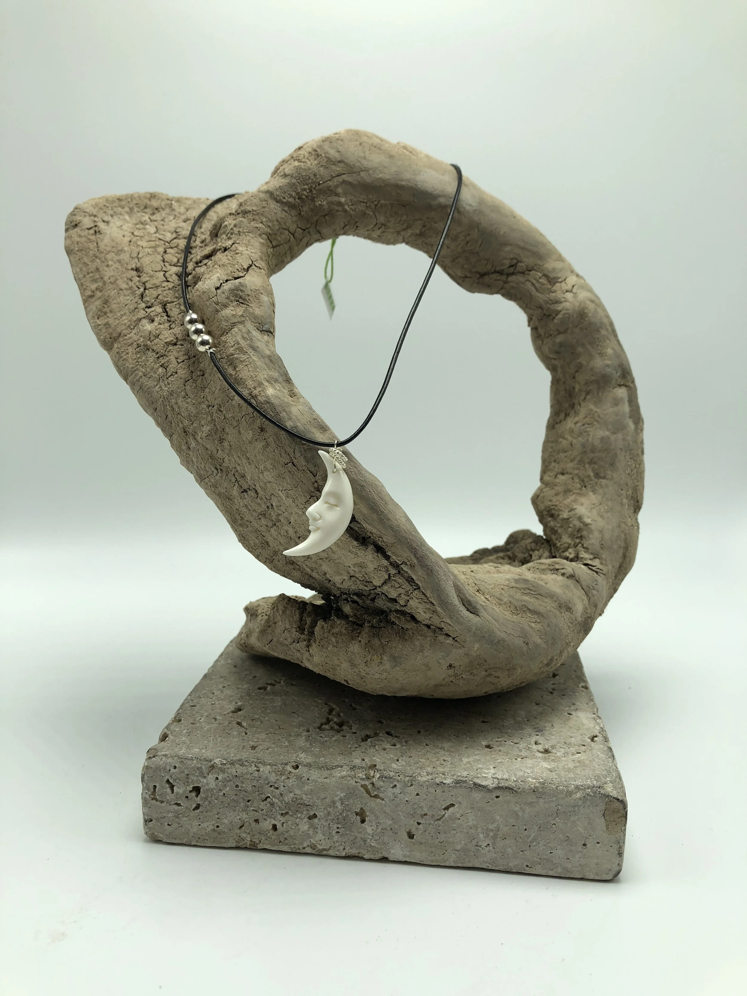 Hand Carved Bone Skull on Leather