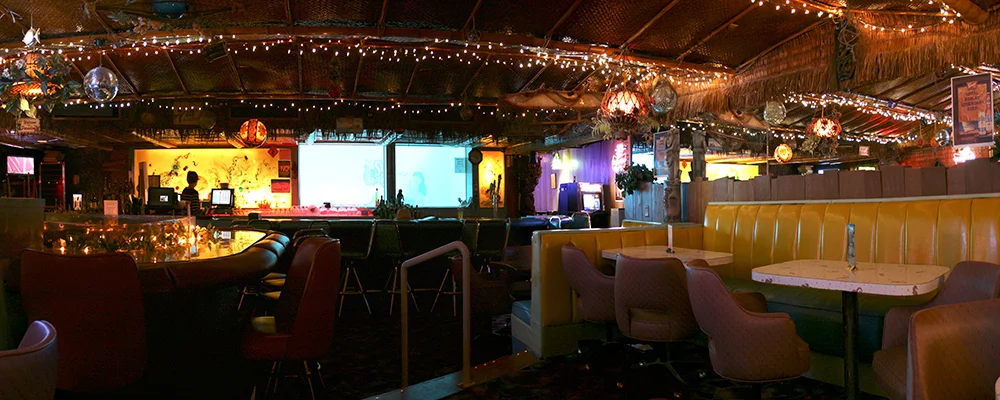 A panoramic of the lounge from the north wall, facing south towards the bar.