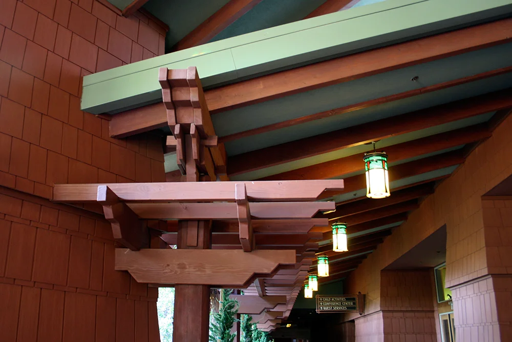 Exposed beams on the walkway to the pool area.