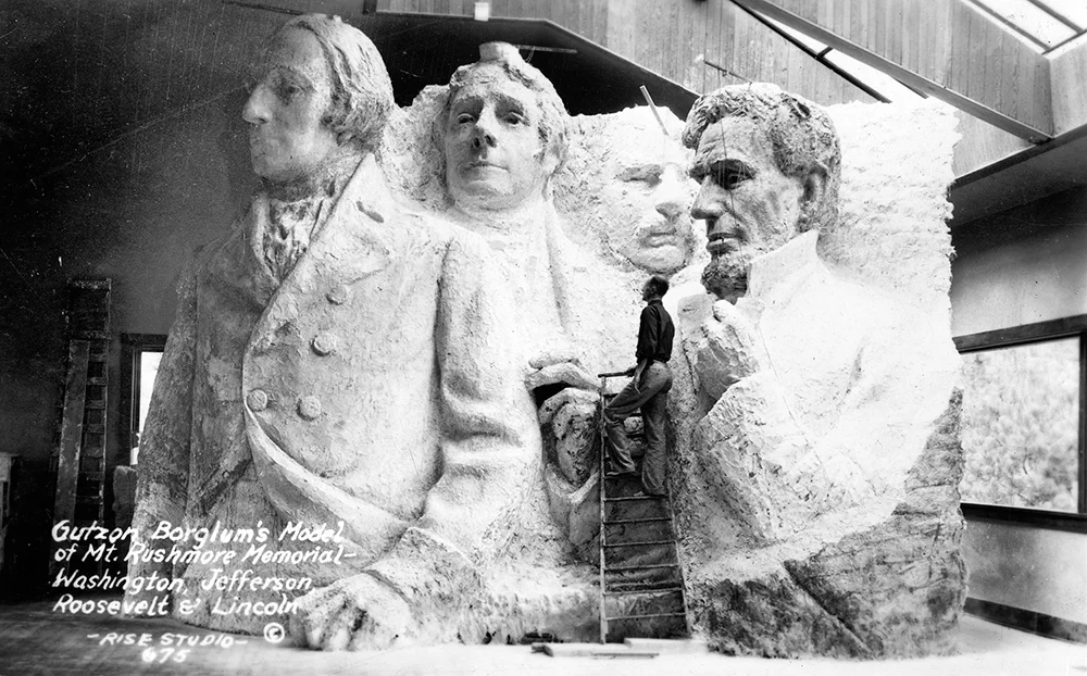 Borglum with his concept model for the monument, 1936, Public Domain .
