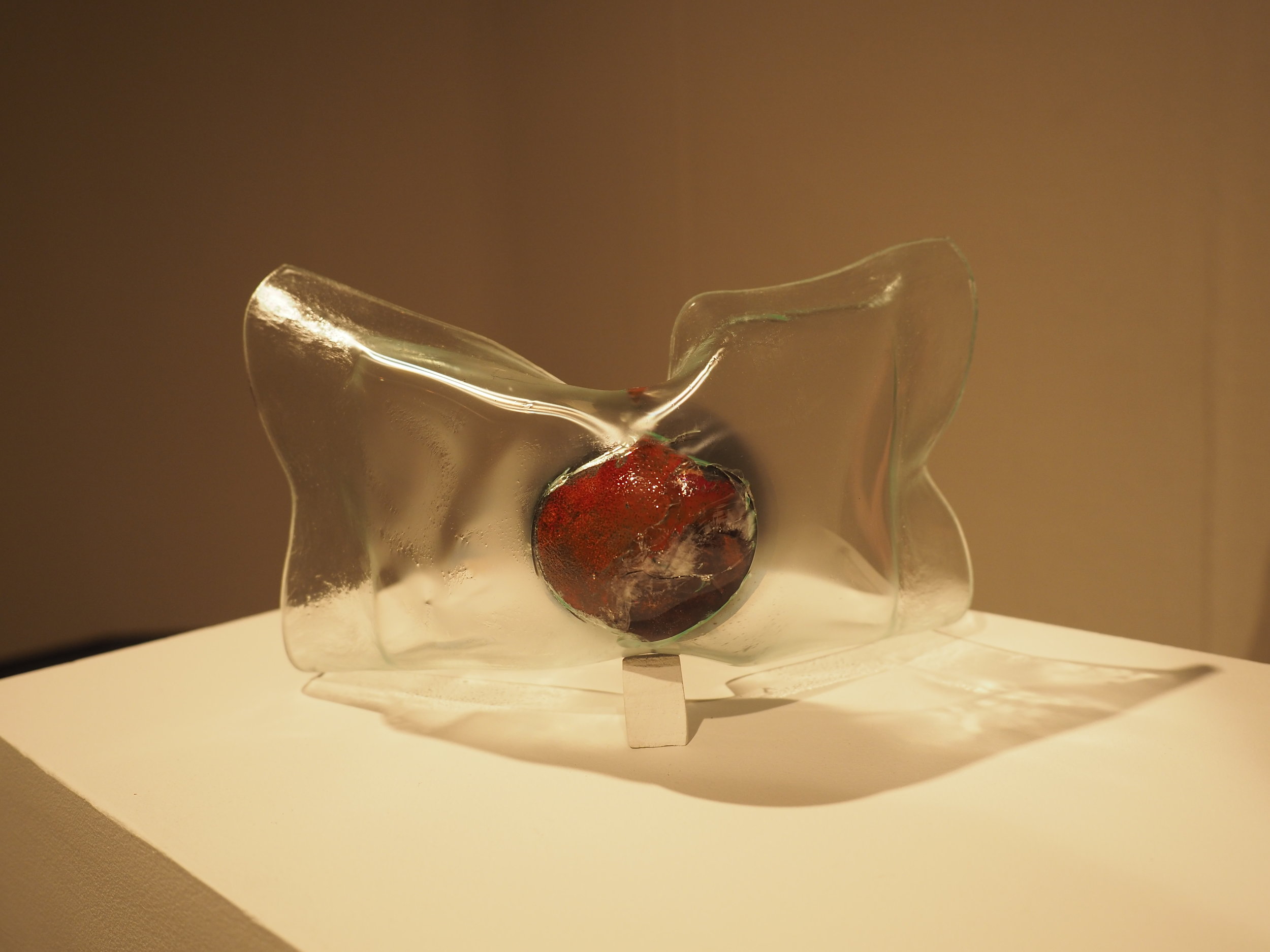    Impact Horizon 8    (2017)  cast bronze, kiln formed float glass  6”x10”x4.5”   