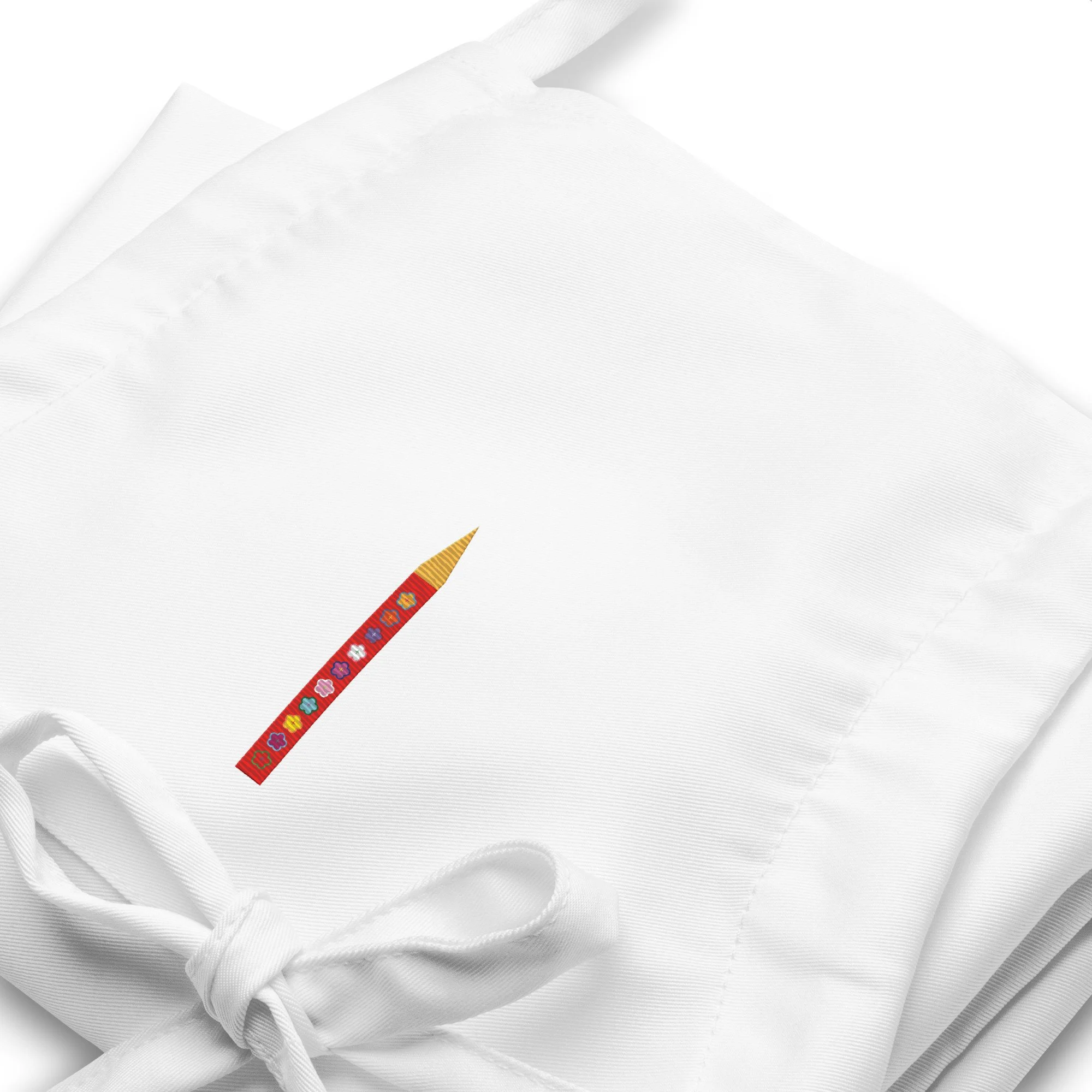 embroidered-apron-white-zoomed-in-69f034a5c6a33.jpg