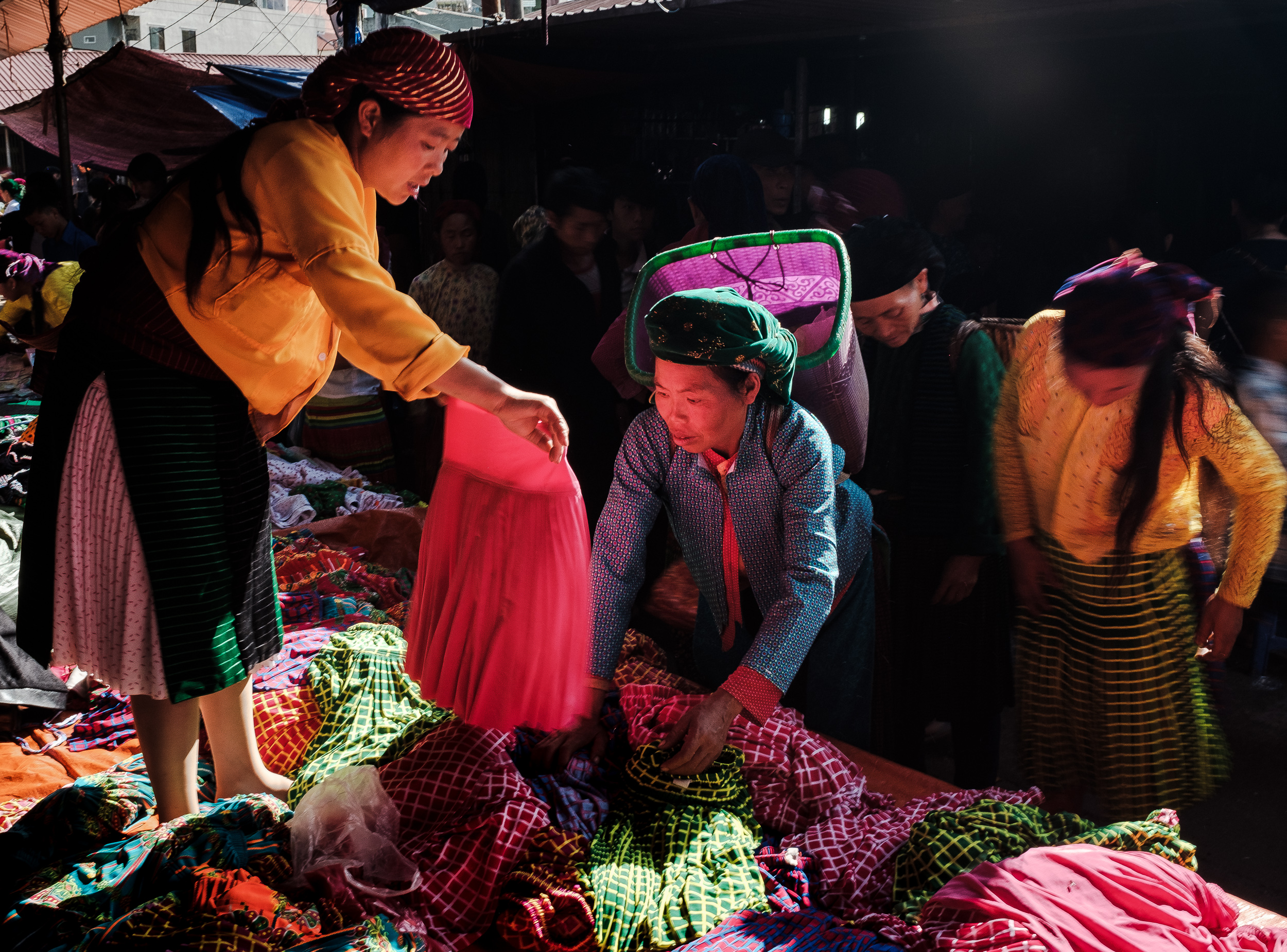  A minority woman trying to negotiate a price for the cloths in Northern vietnam Dong van market 