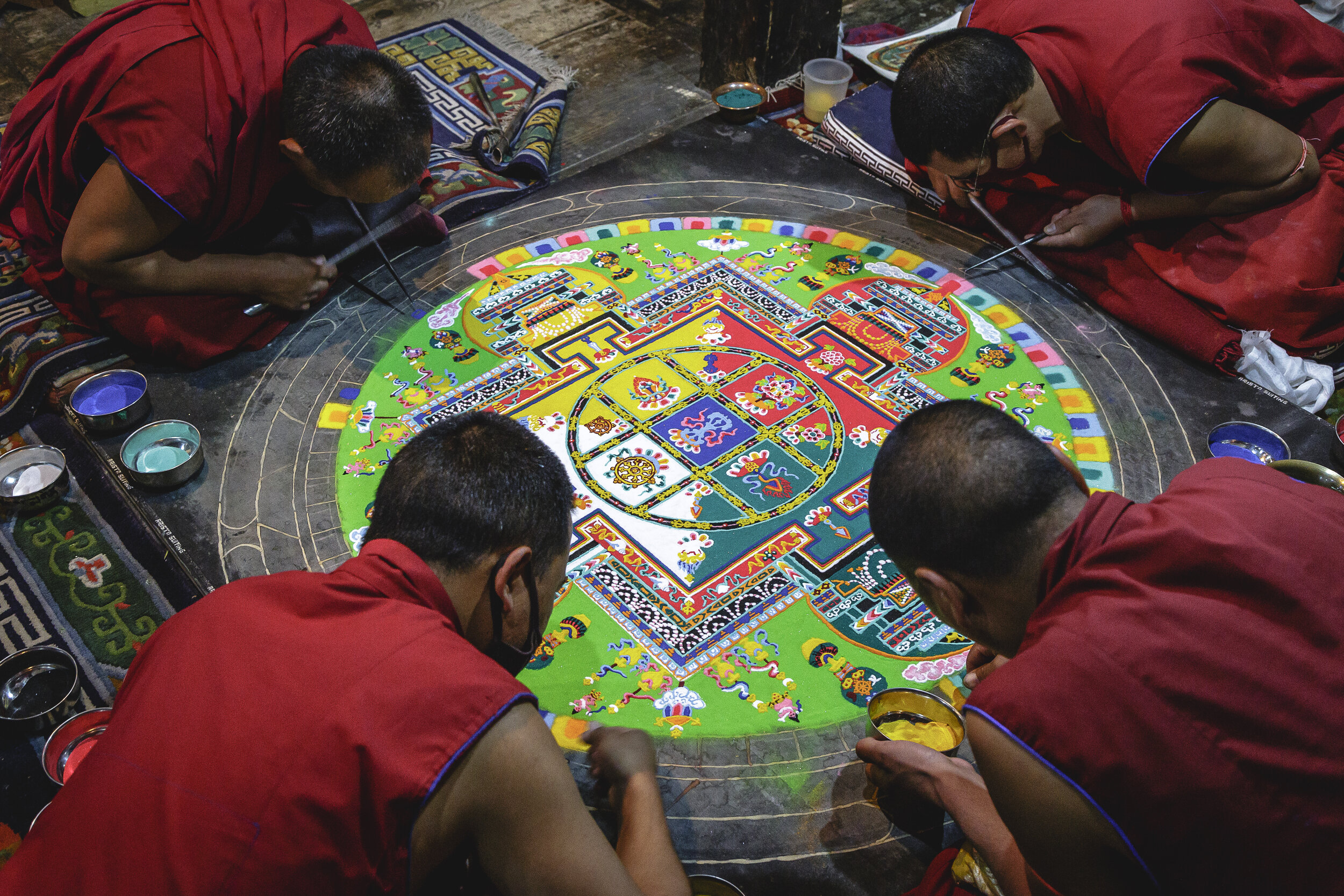 Buddhist monks creating Mandala in thiksey monastery in Ladakh i