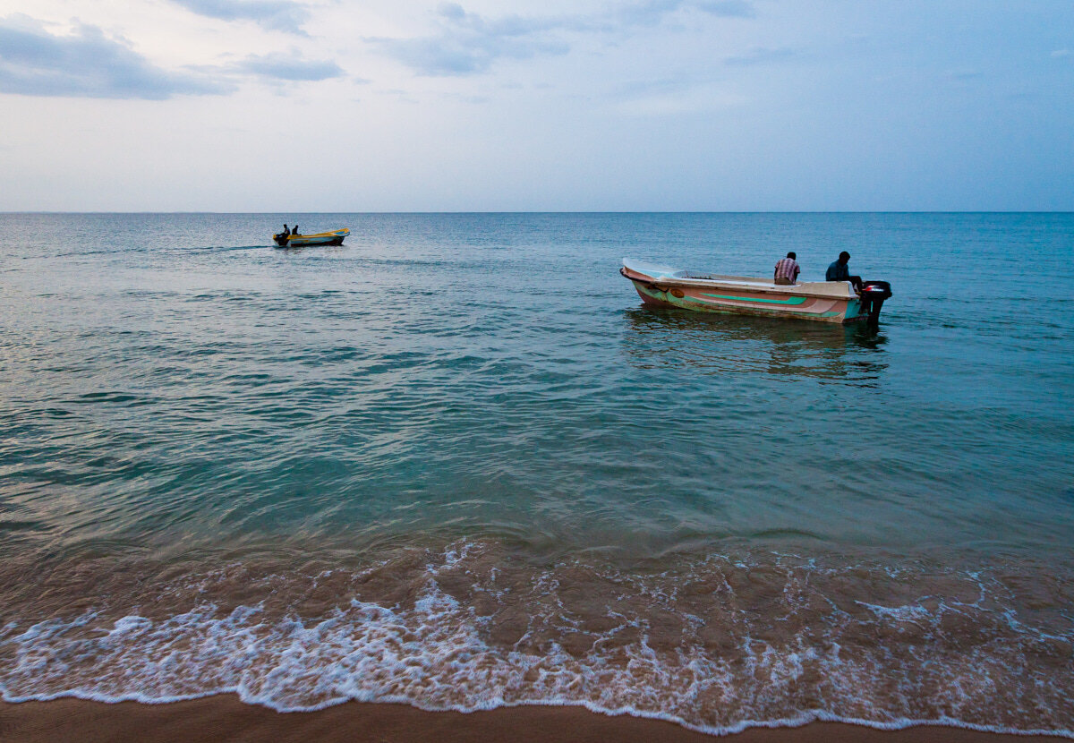 Boats leaving the shore for fishing in Batticaloa sea during dus