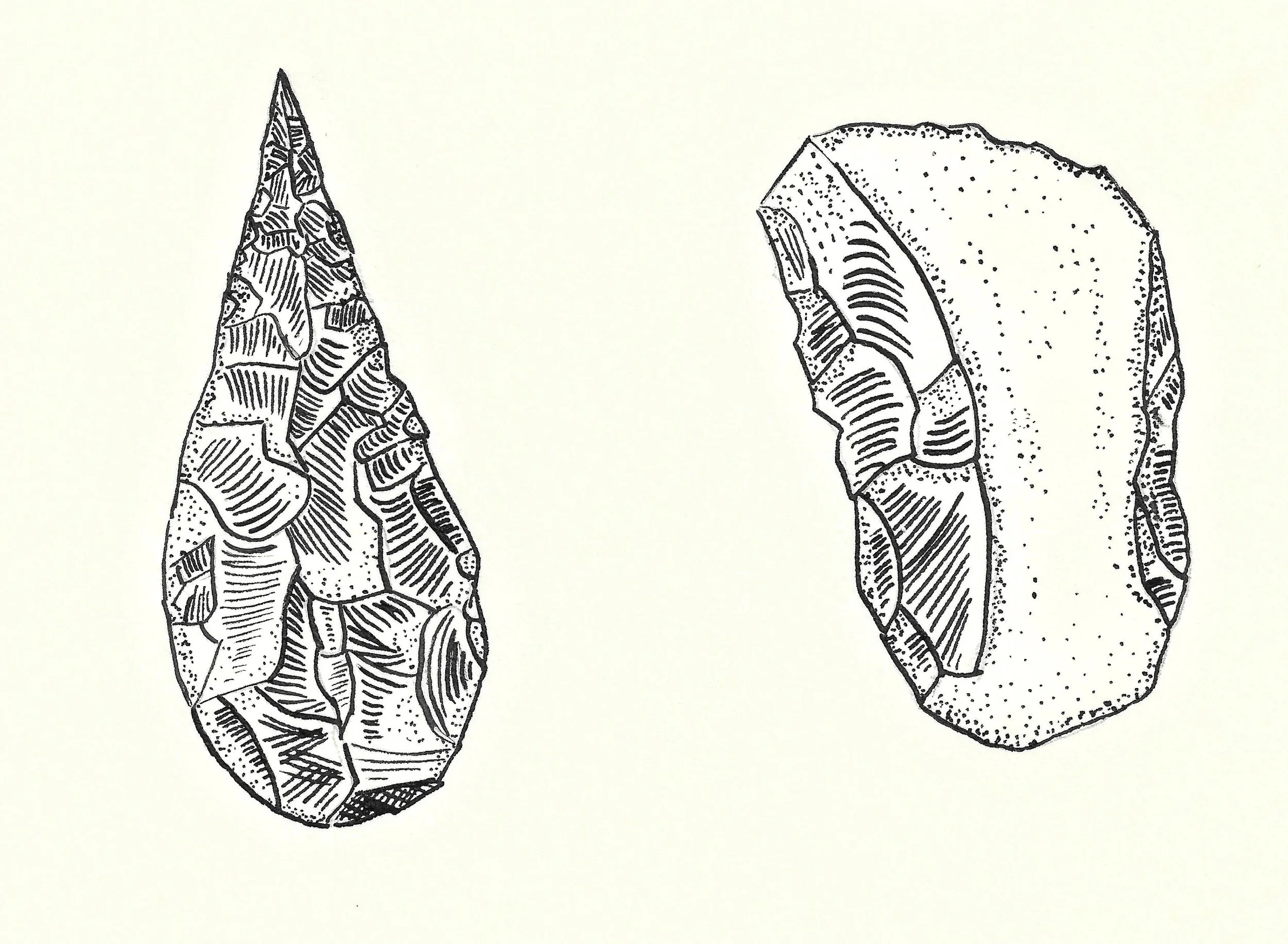 A handaxe and a cleaver. Stone tools of the lower palaeolithic period.
