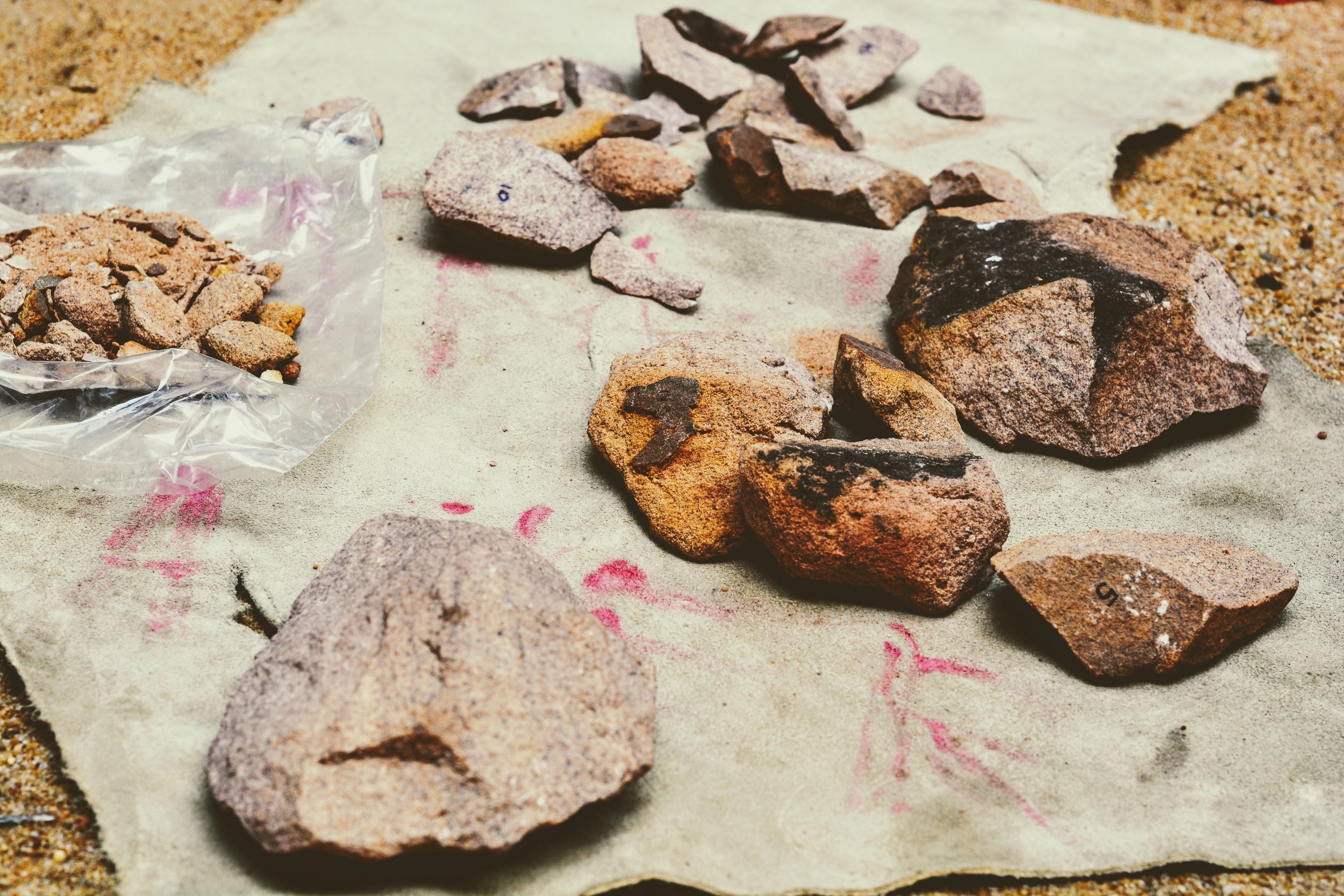 The flakes of a stone tool could serve as a sharp blade or help piece the jigsaw puzzle of a missing tool.