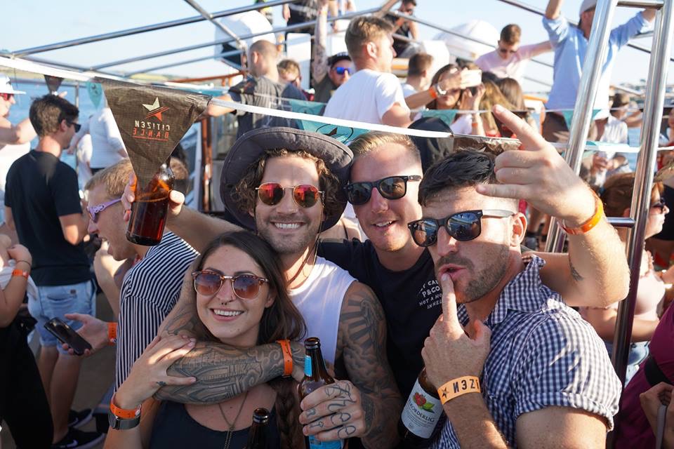 Big smiles loving the live music aboard a boat hire