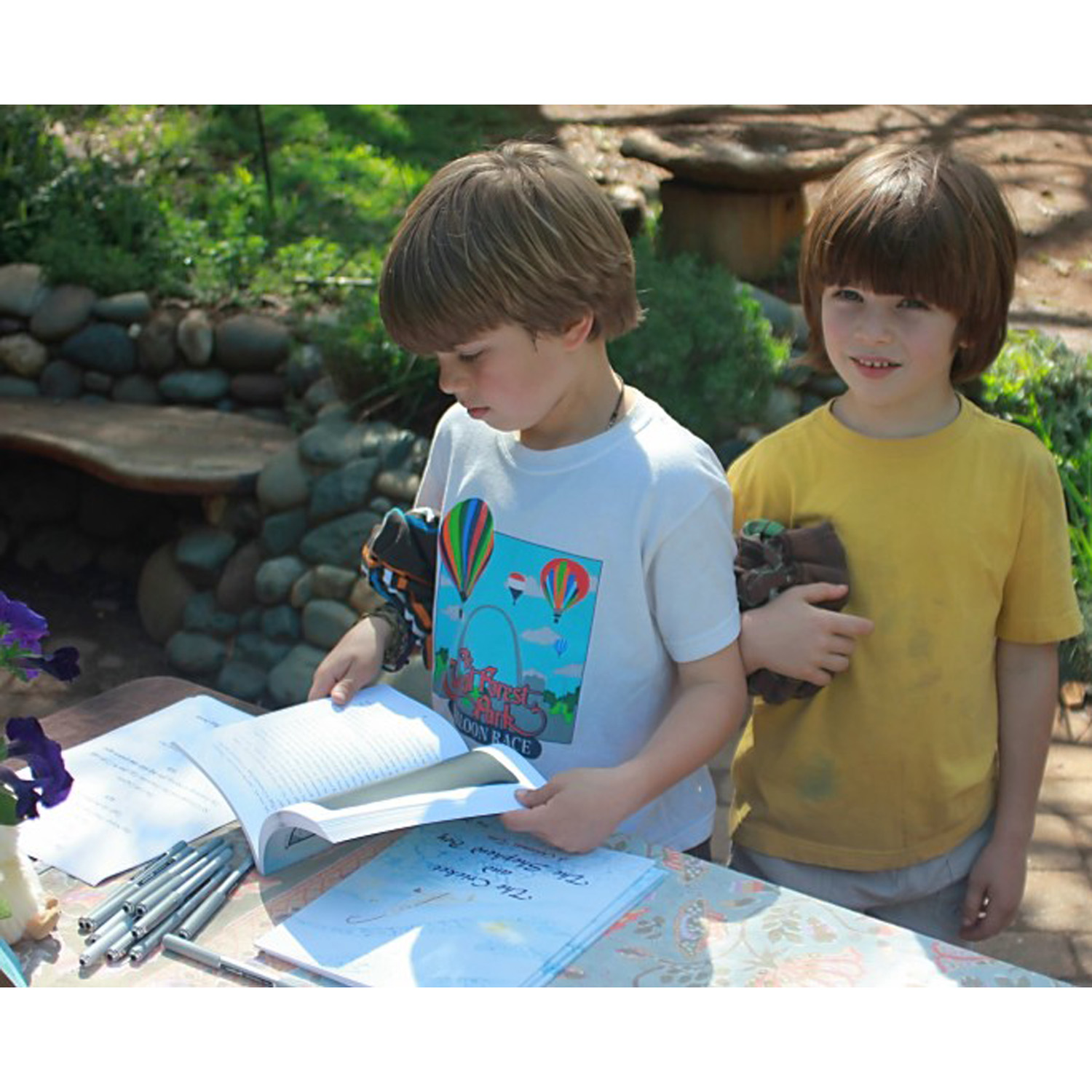 two boys check out the books :)