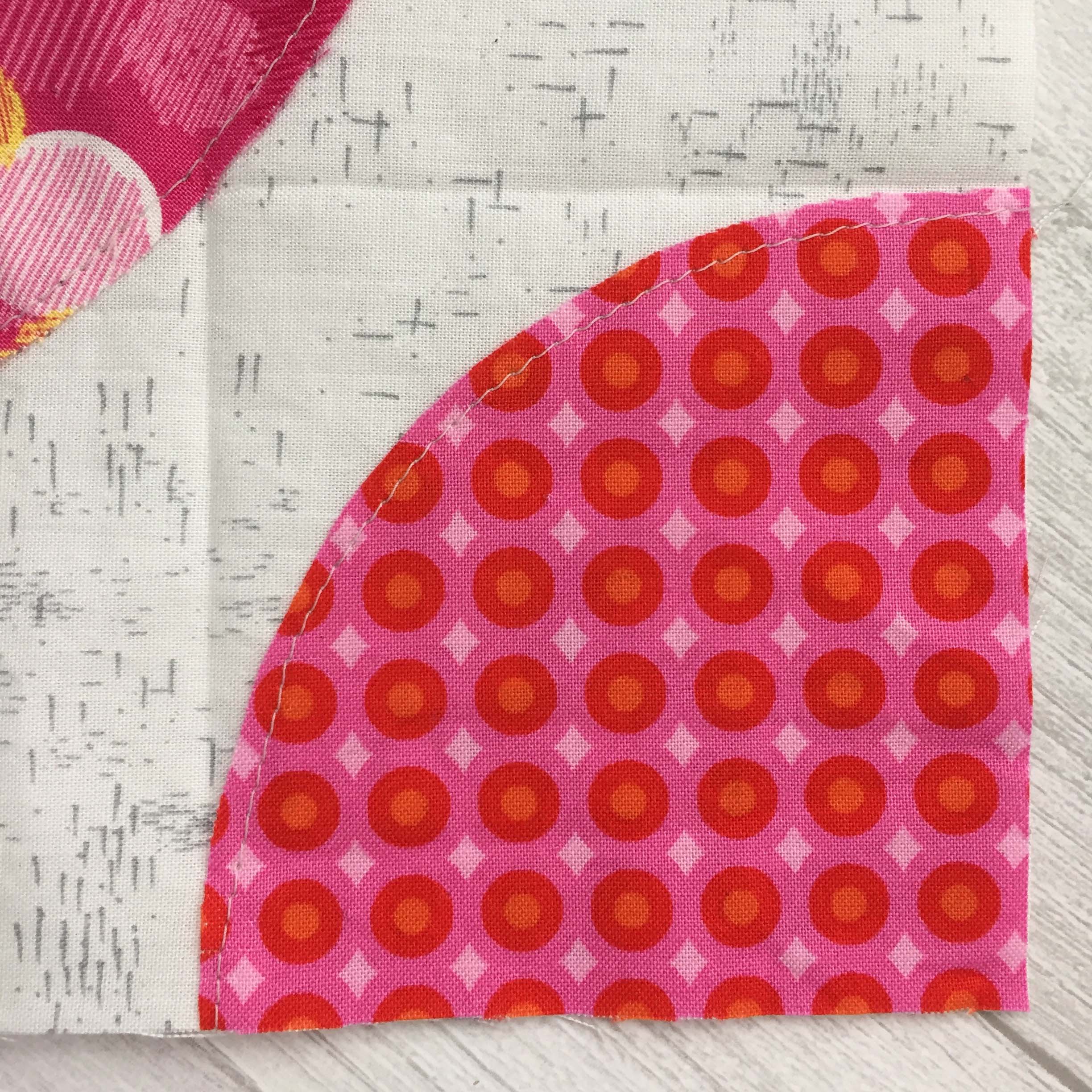 Tipsy Twofer close up of finger pressed creases & placement of applique pieces.jpg