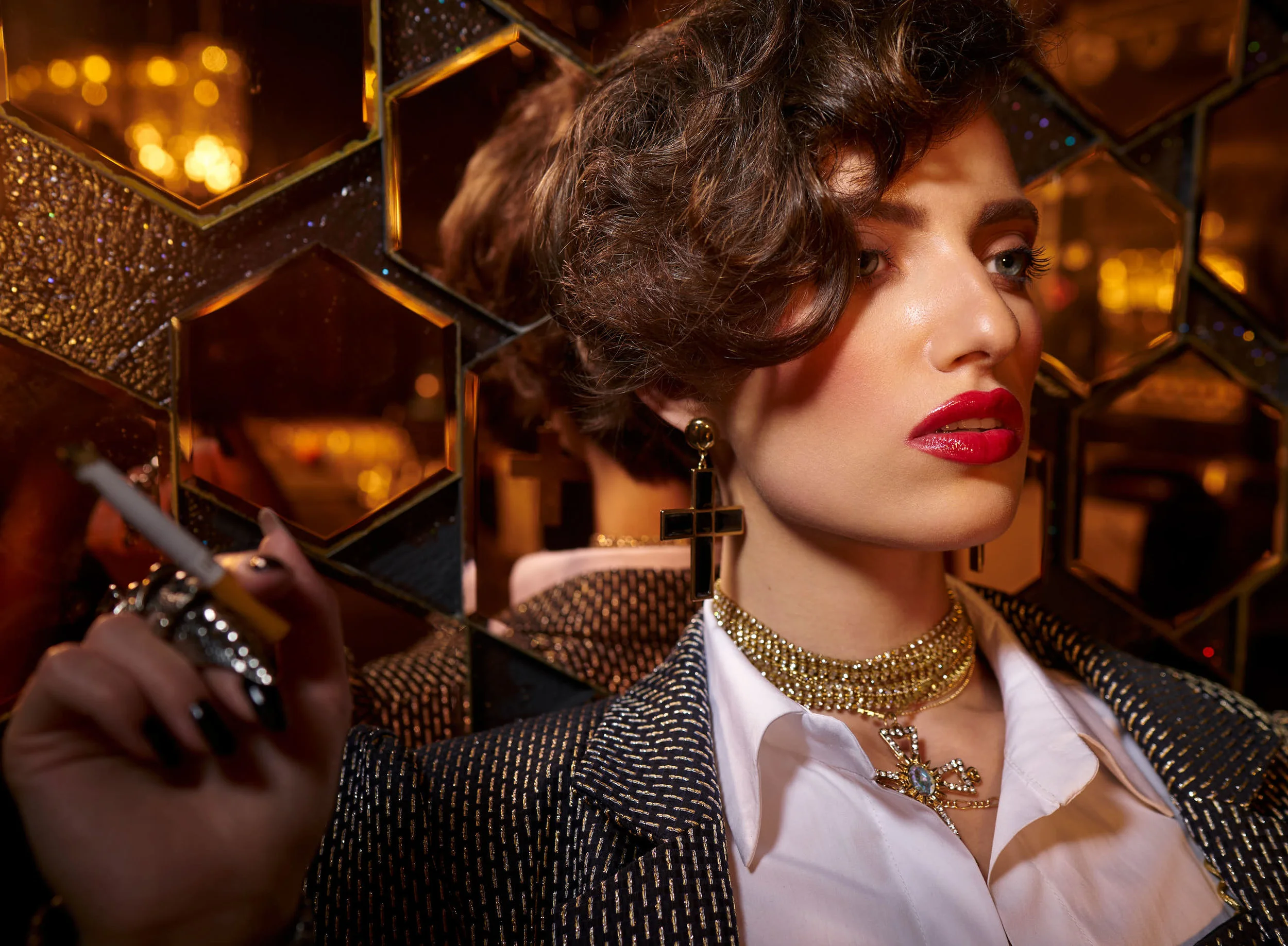 Glamorous woman holding a cigarette