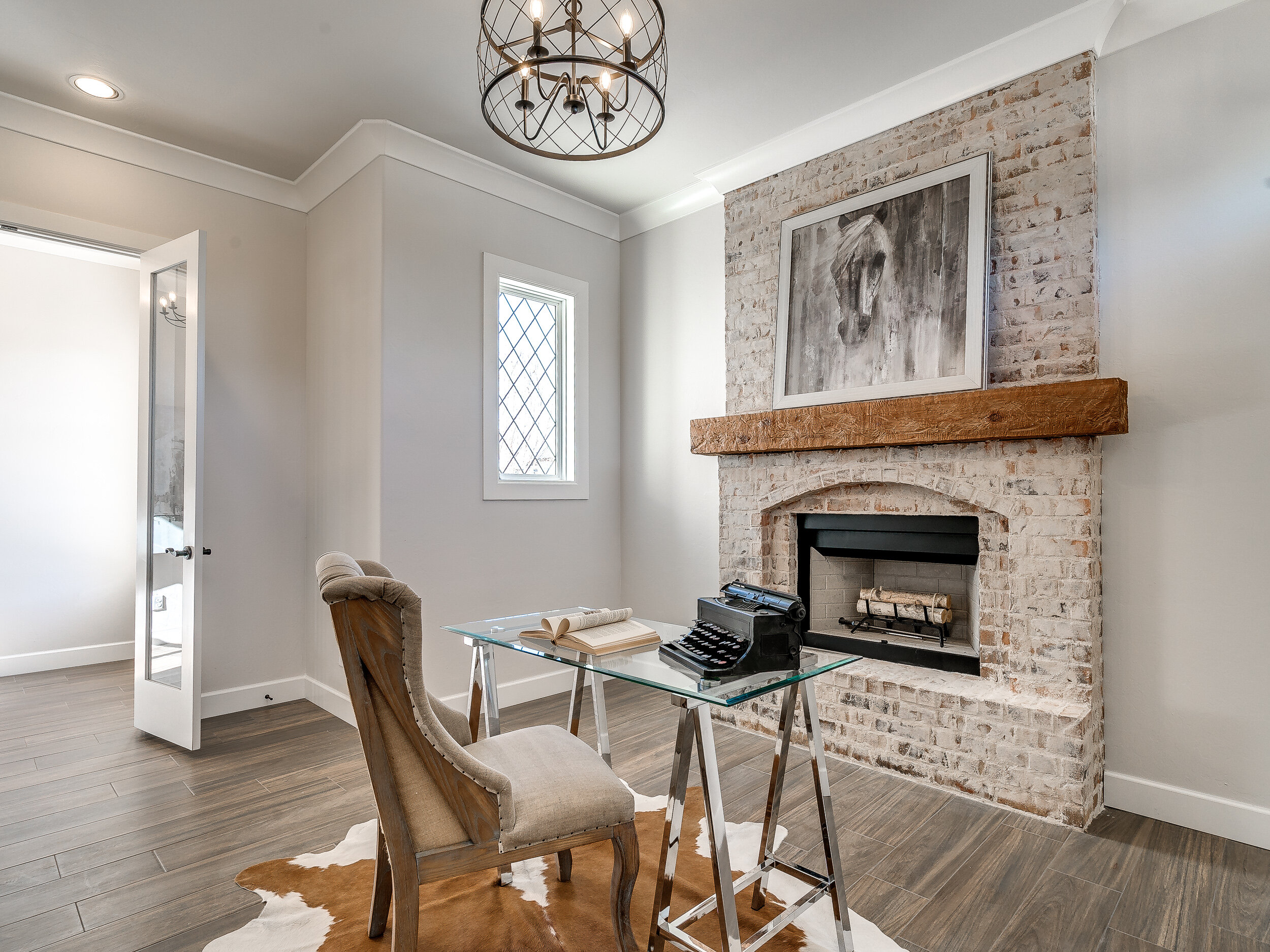 Light brick fireplace in home office