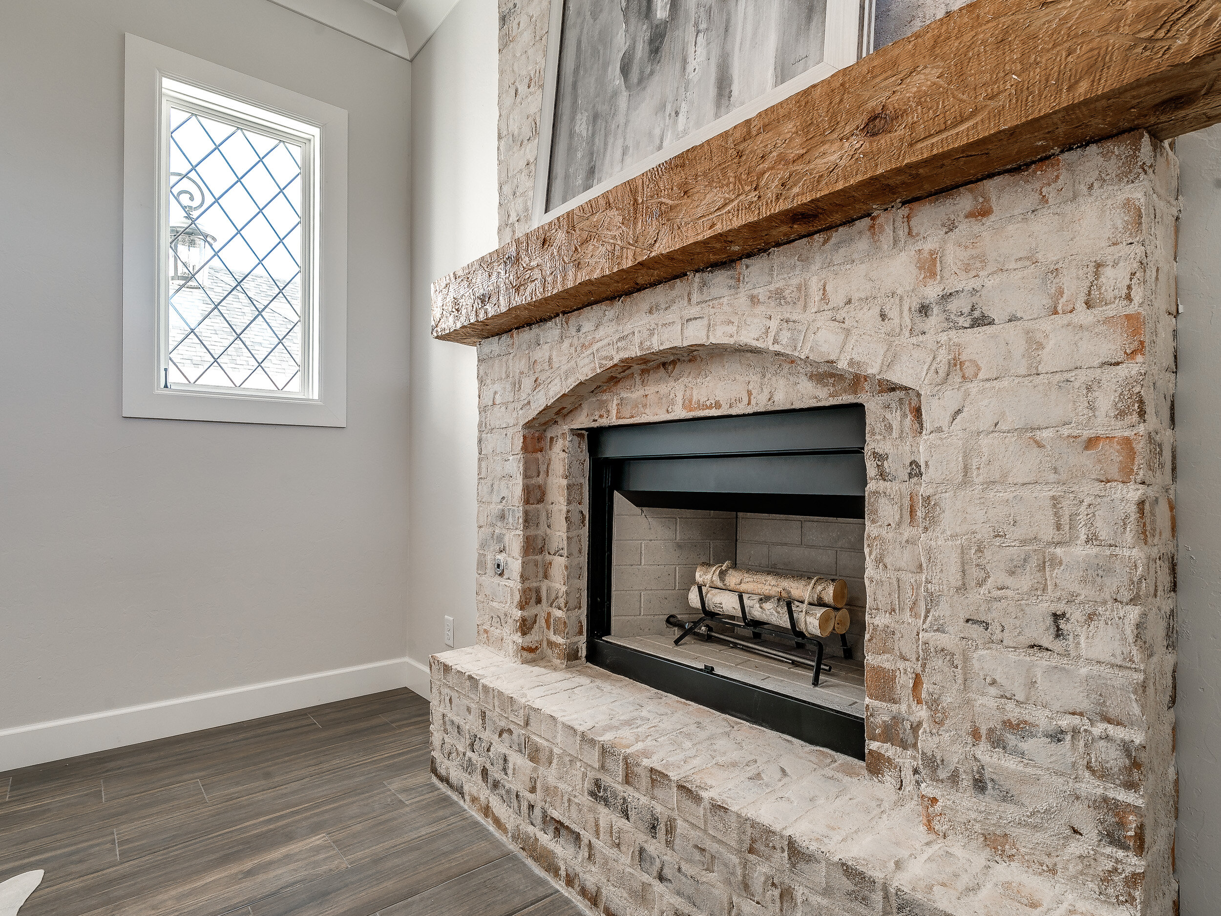 Light brick living room fireplace