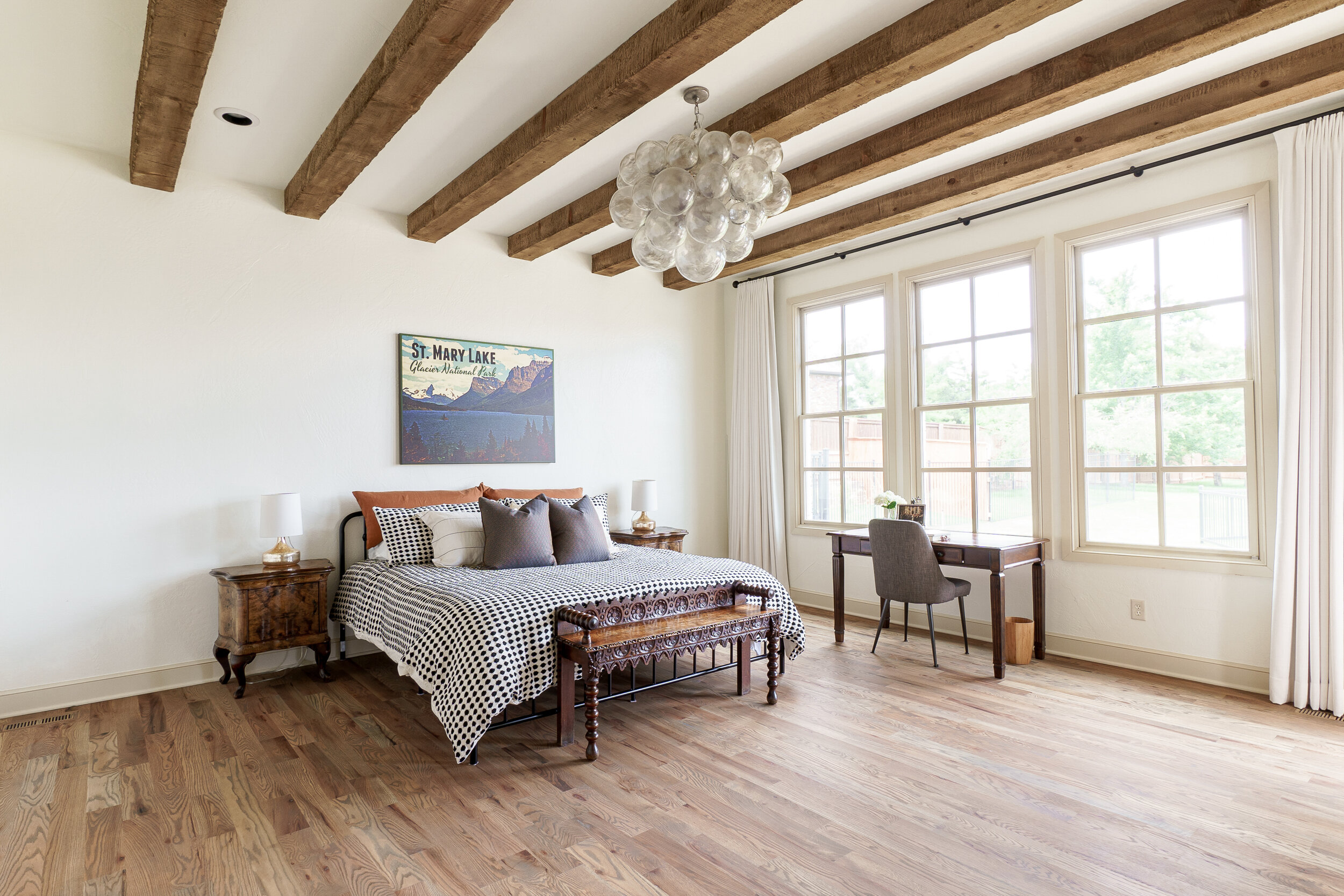 Natural wood beams in bedroom 