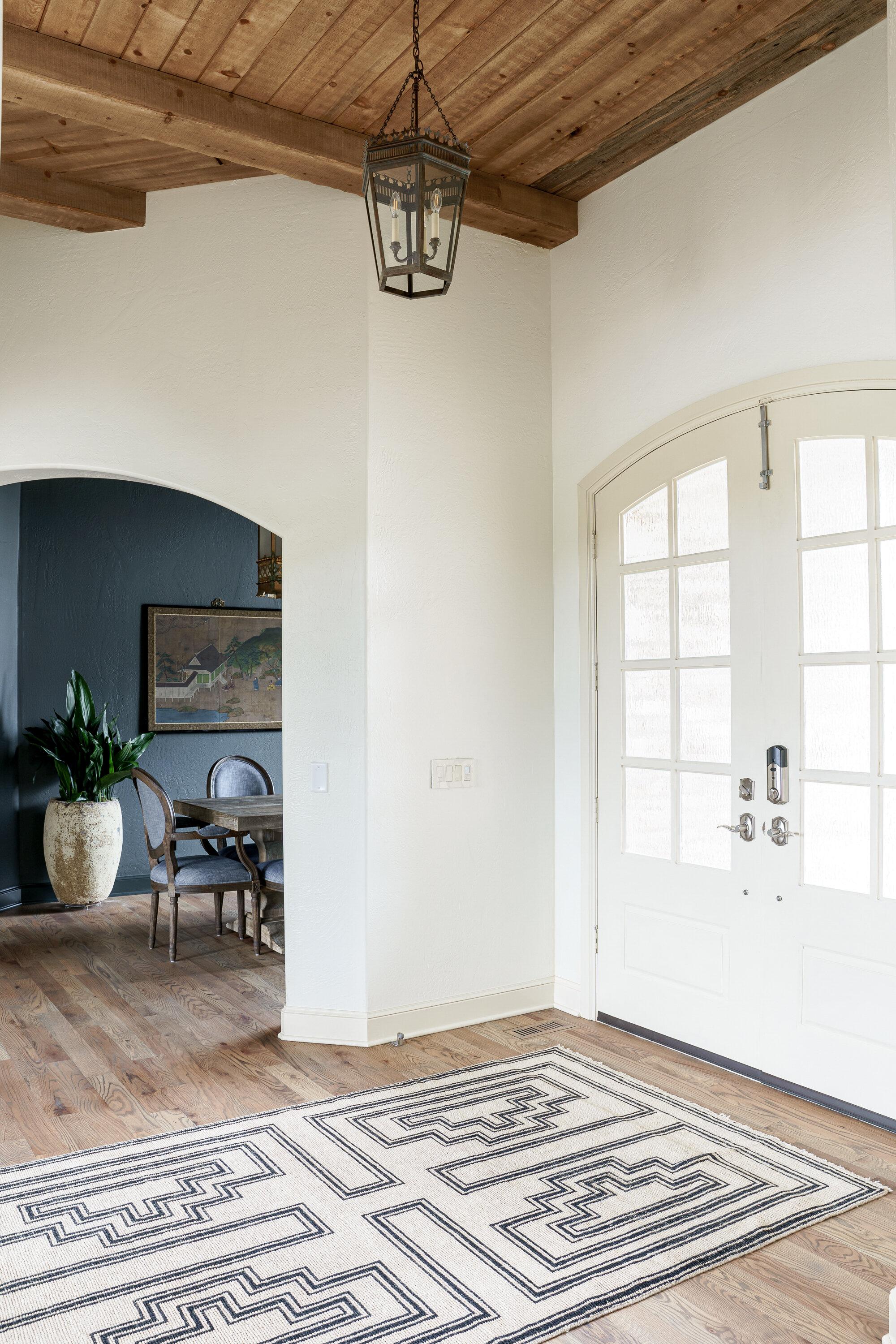 White arch front doors