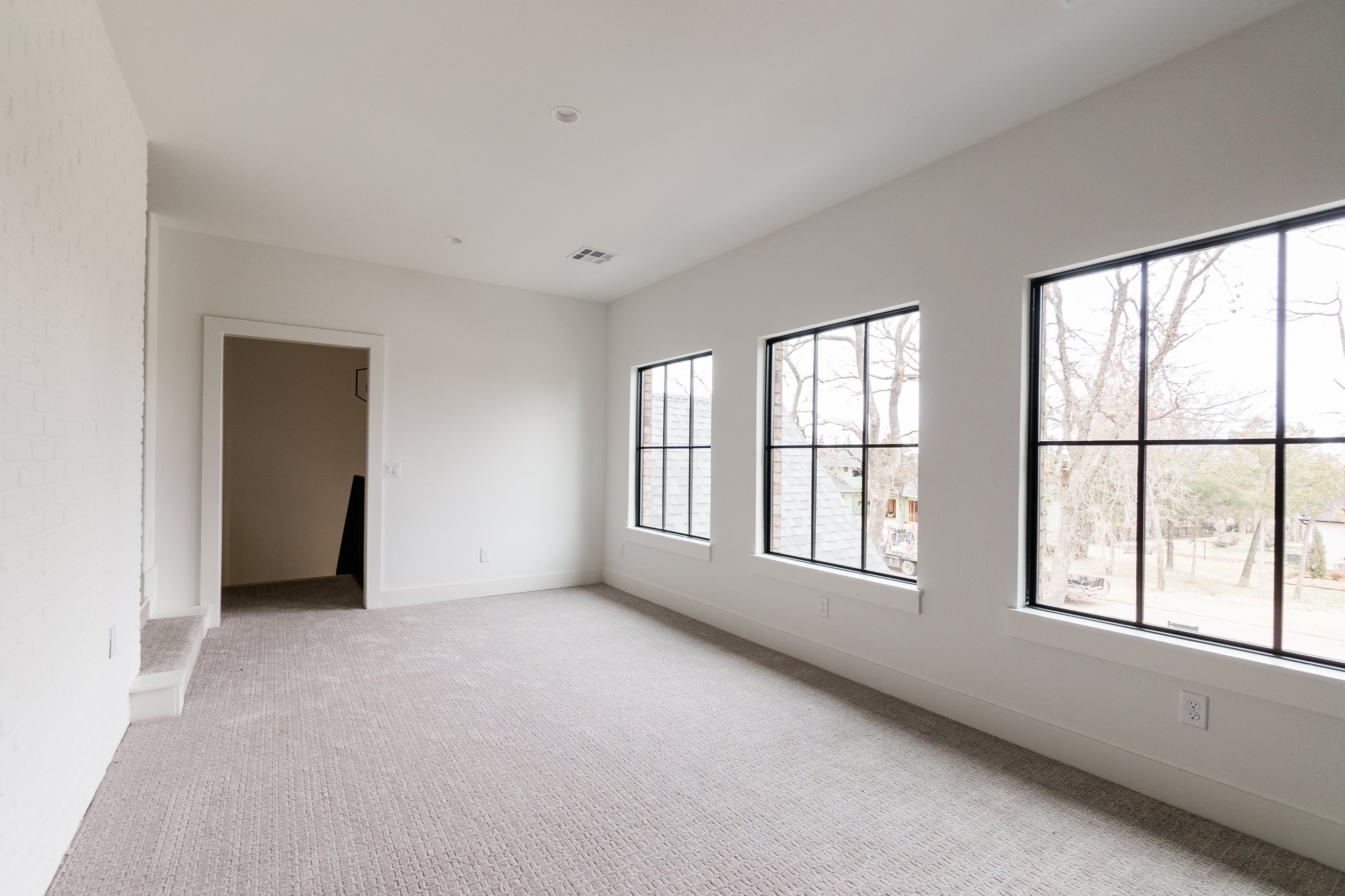 Open room with large windows 