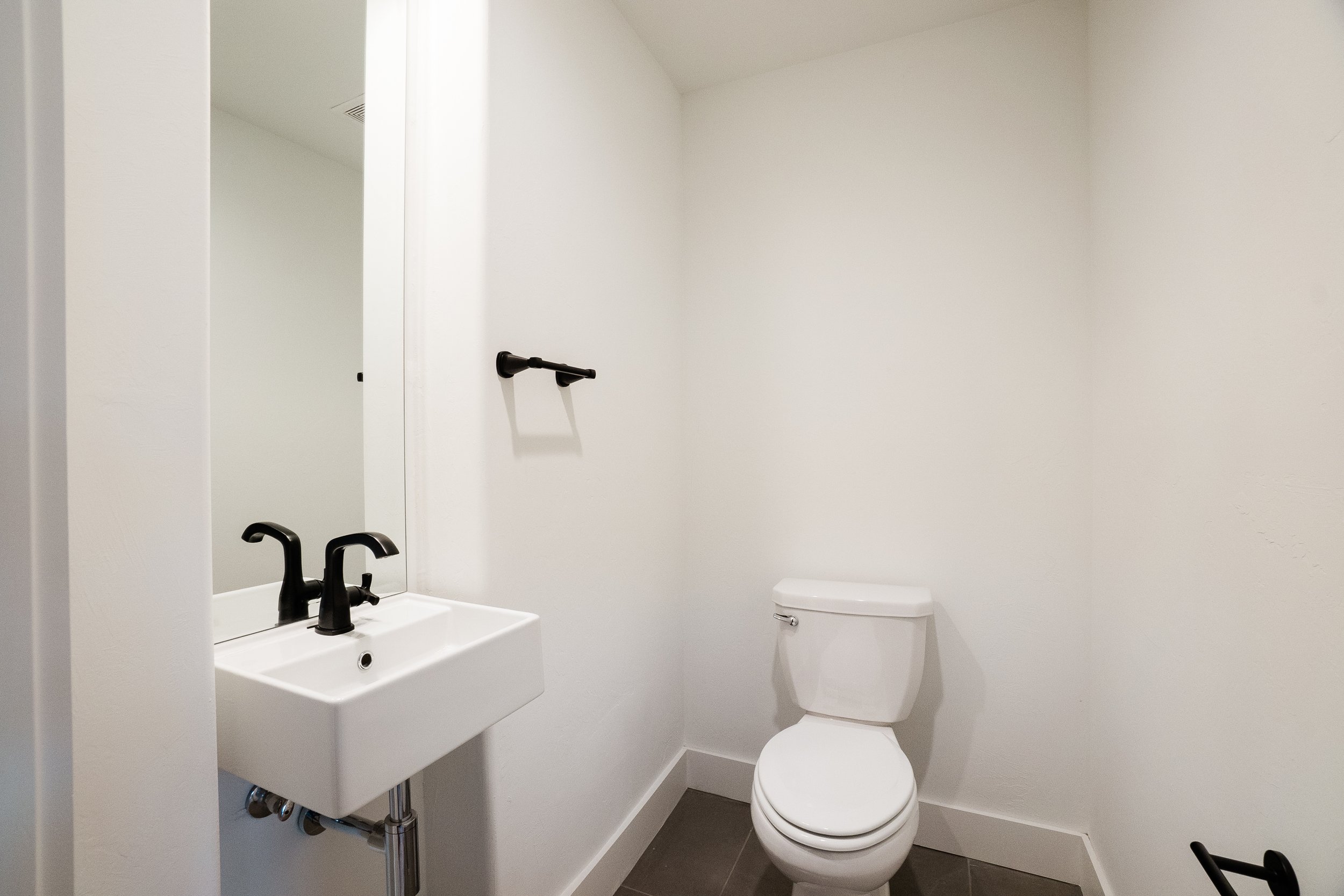 Powder room with white sink 