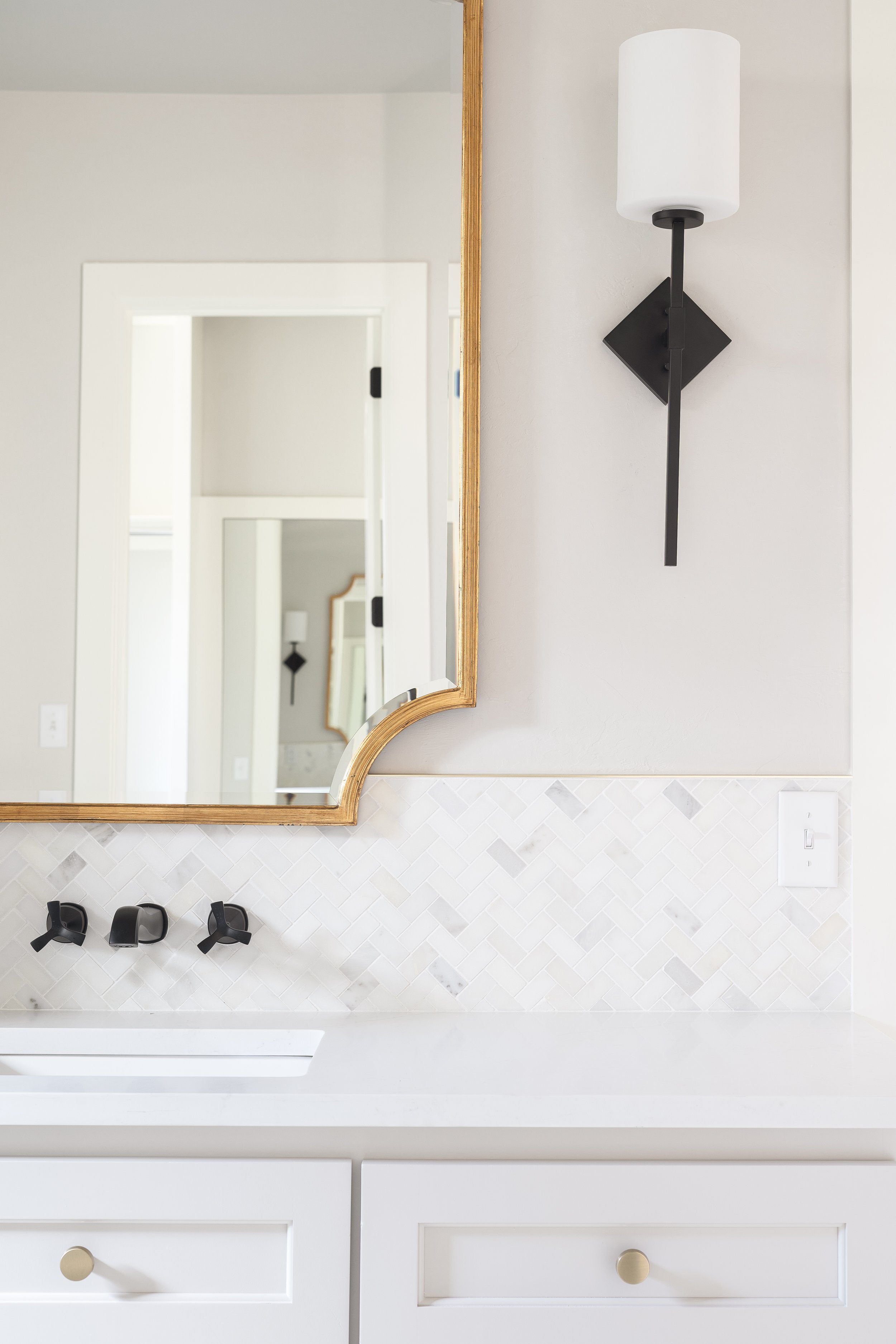 Gold and white master vanity