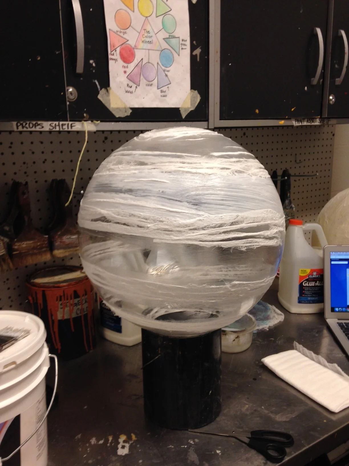  I used a 10 inch clear acrylic ball as the base. I then used Sculpt Or Coat and cheesecloth to create a spiral effect all over the ball. 