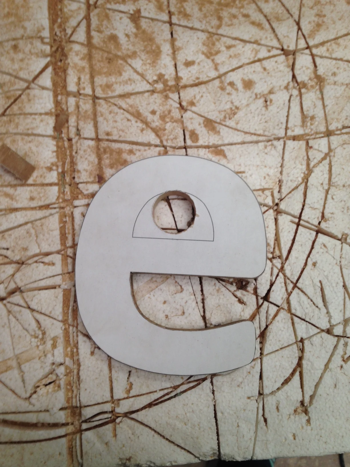  I started with having all the letters on paper and attached them with spray 77 adhesive. I cut all the letters out on the band saw. I used a forstner bit to cut holes in letters that needed it. I then used a jig saw to cut the remaining material. 