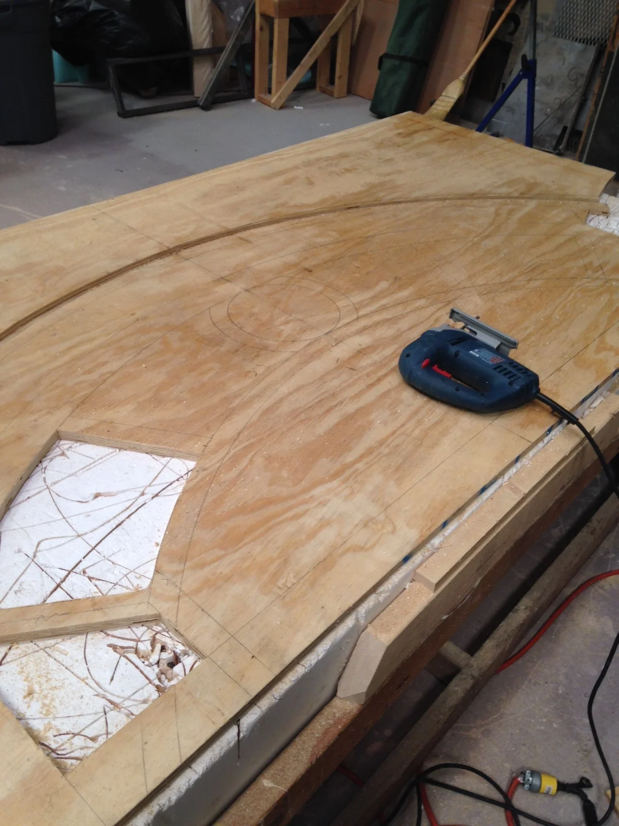  First I drew out the design on to some plywood. I used a jigsaw to cut it all out. 