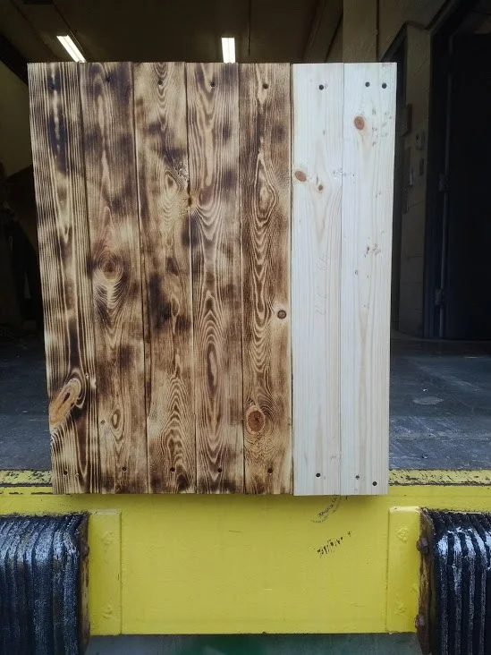  Using a torch to bring out the grain the the wood 