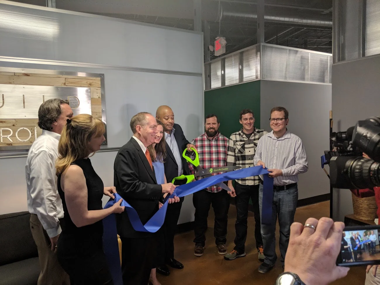 The Build Carolina/Carolina Code School team, joined by Mayor Knox White, Chamber president Carlos Phillips and NEXT CEO John Moore at our ribbon-cutting event on March 20. 