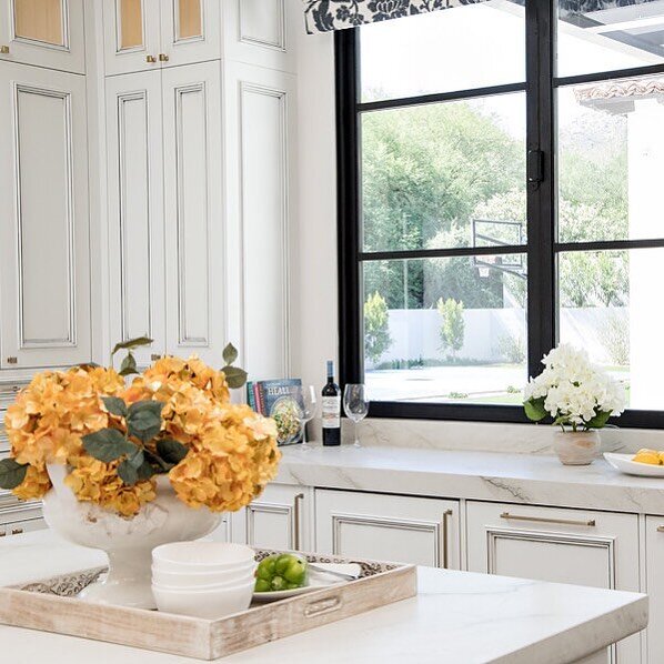 What I really love about kitchen design is pulling together your entire design aesthetic;  from layout, to flooring,  to cabinet style, to hard surface finish colors, to hardware, to lighting, and THEN the fun of appliance needs, window coverings and
