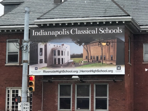Current billboard at 16th & Delaware features Indianapolis Classical Schools. Art by Justin Vining.