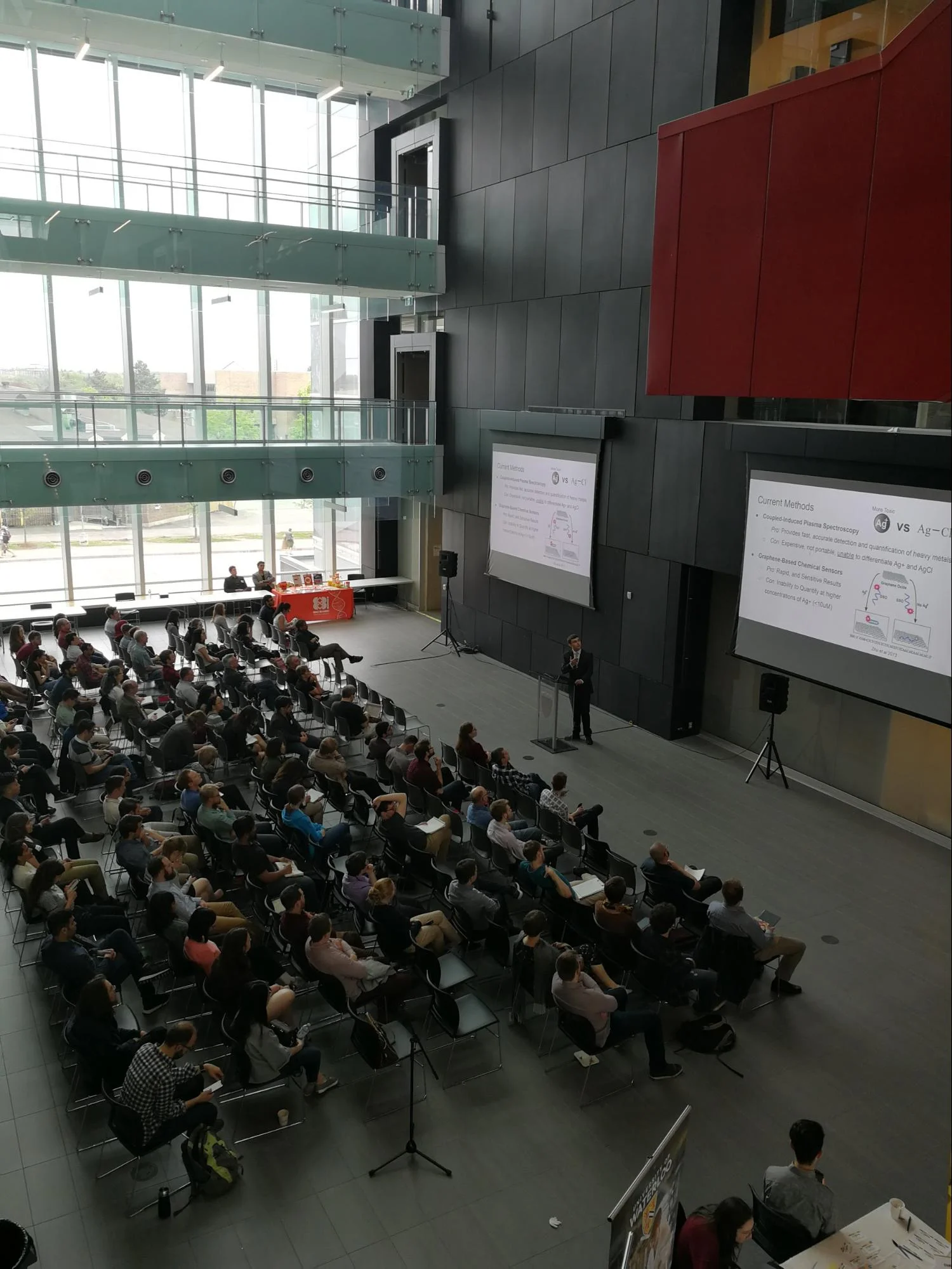 Adam Radek Martinez delivering his (award-winning) research talk at SynBio 4.0. Photo courtesy of @Synbiosymp and WCMR .