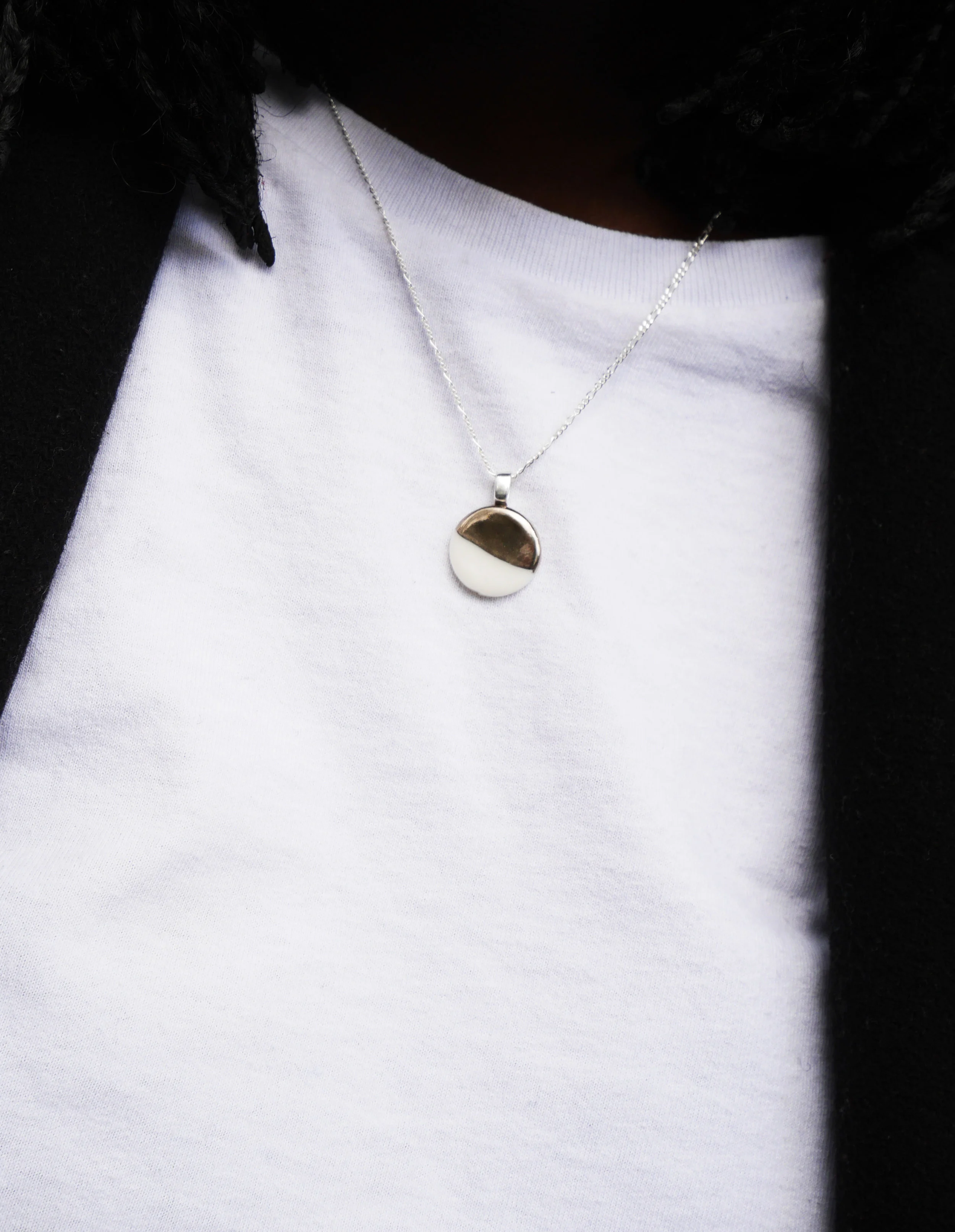 Porcelain ceramic pendant on sterling silver chain with platinum lustre