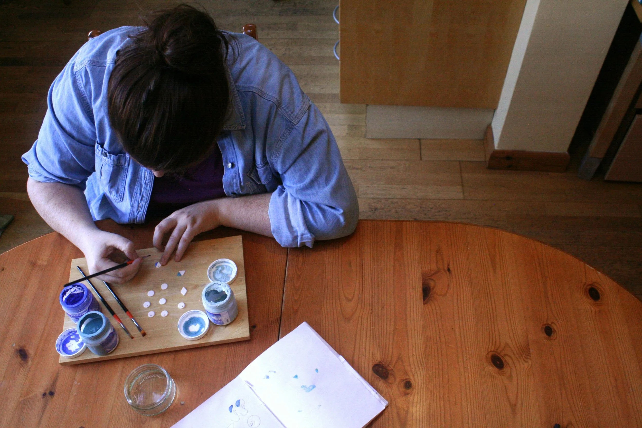 Suzanne painting her porcelain ceramic jewellery