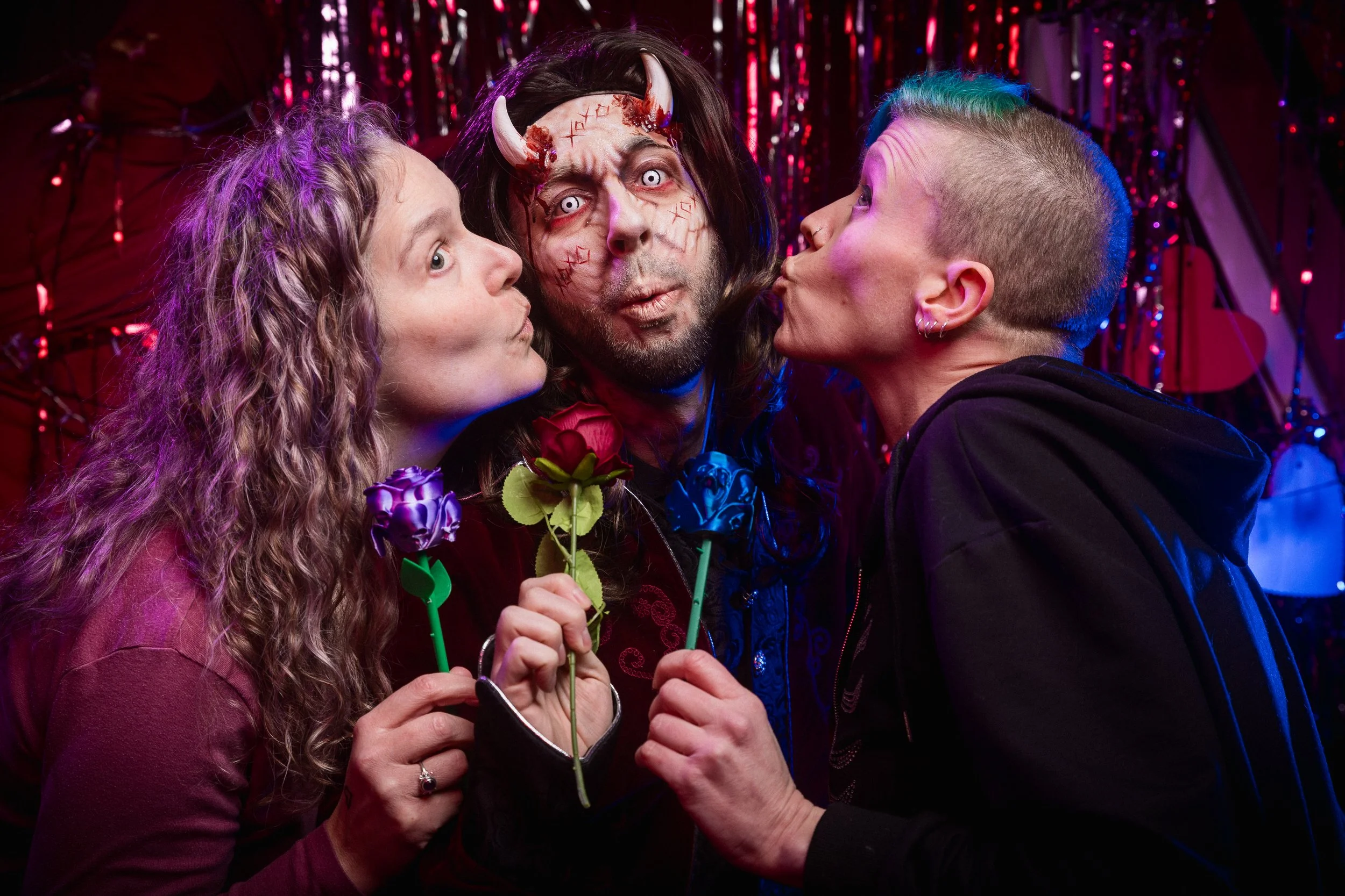 Tim’s haunt character, Charles Twinkle Rhinestone III, poses for an adorable group photo with the customers at Laurel’s House of Horror.
