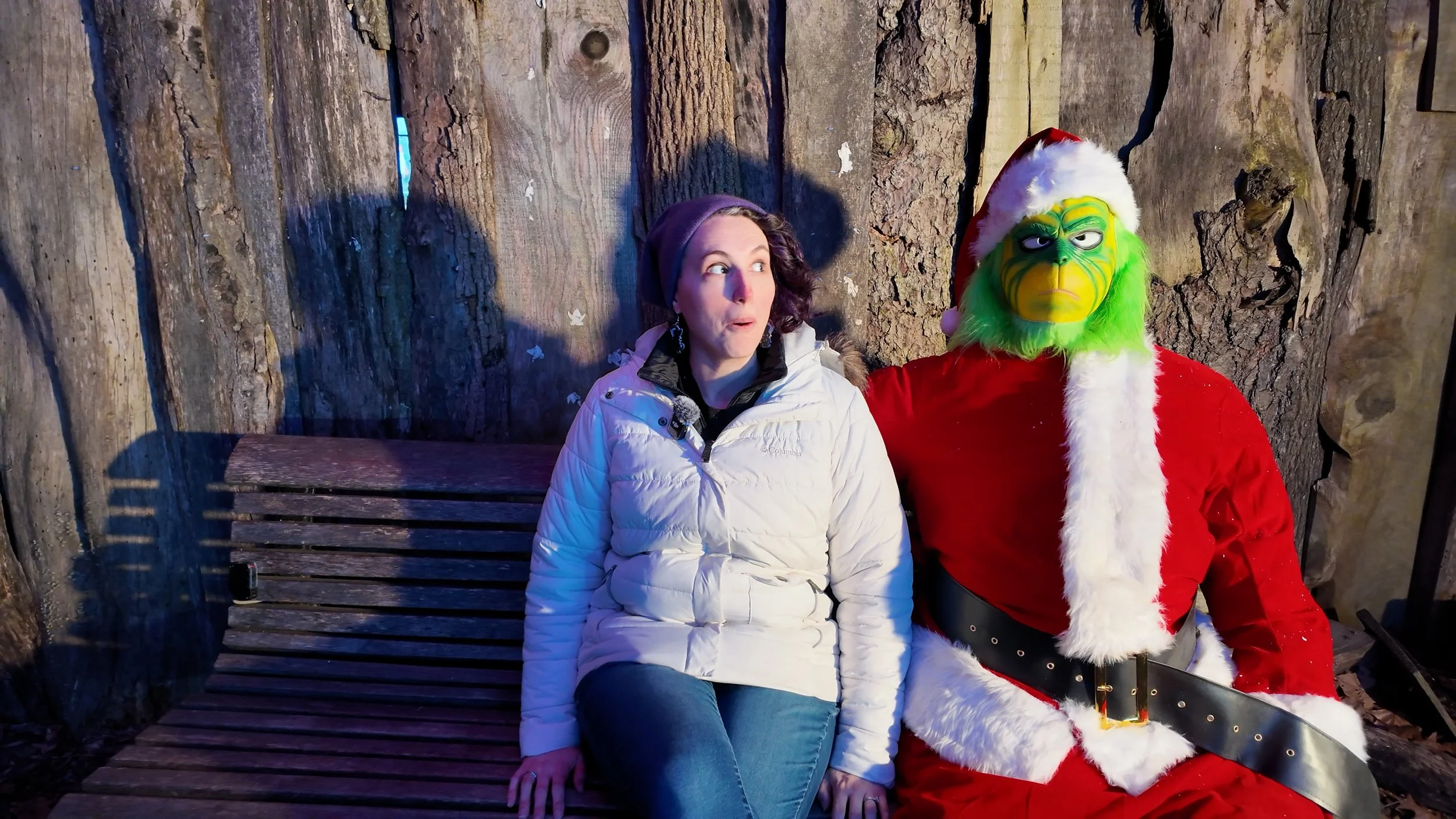 Katie shares a moment with the “Farting Grinch”, a hilarious interactive photo op positioned in the Markoff’s Christmas Farm Midway.