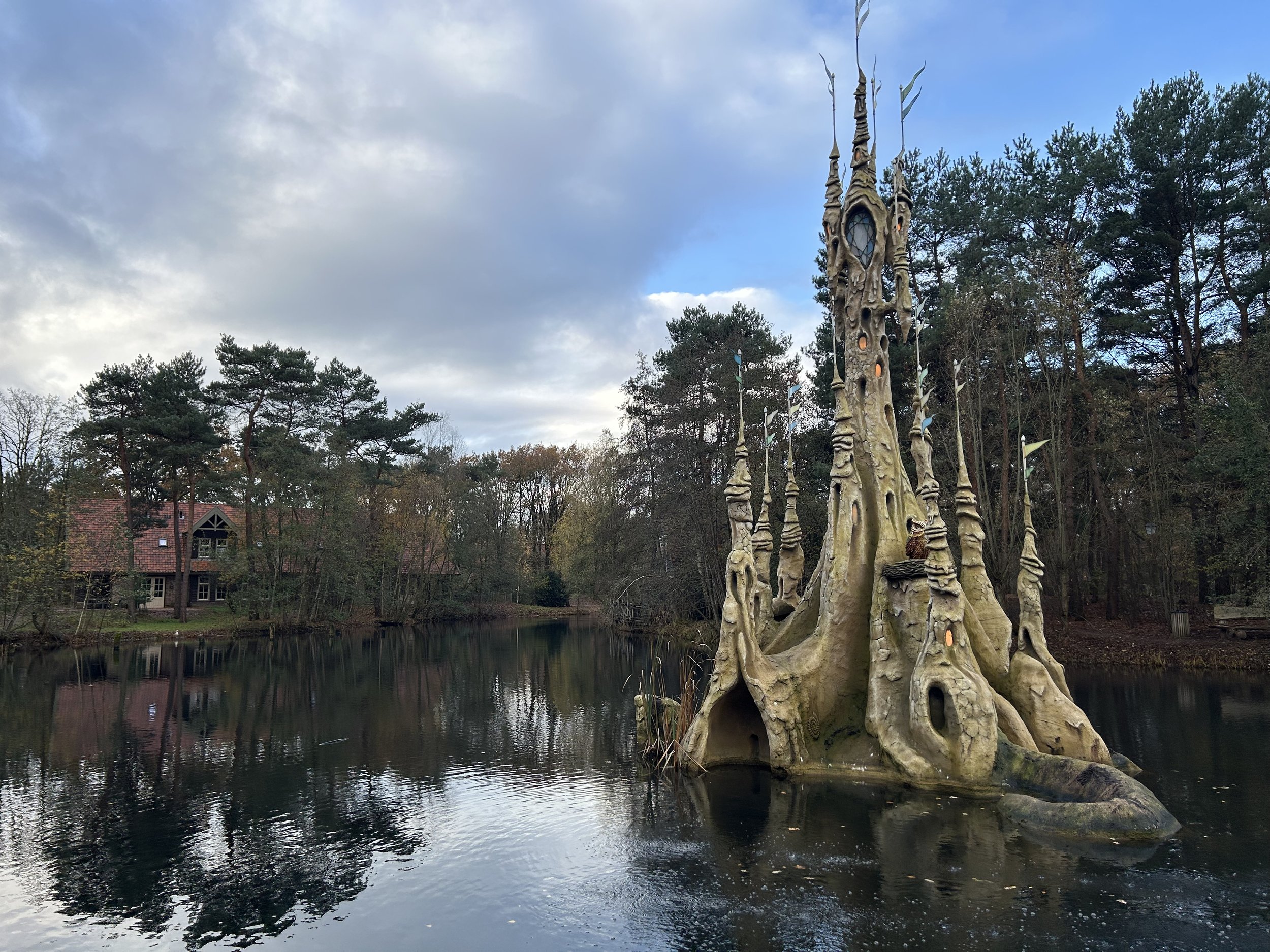 The sandcastle in the middle of the lake at Efteling Bosrijk is home to Klaas Vaak or "Mr. Sandman".