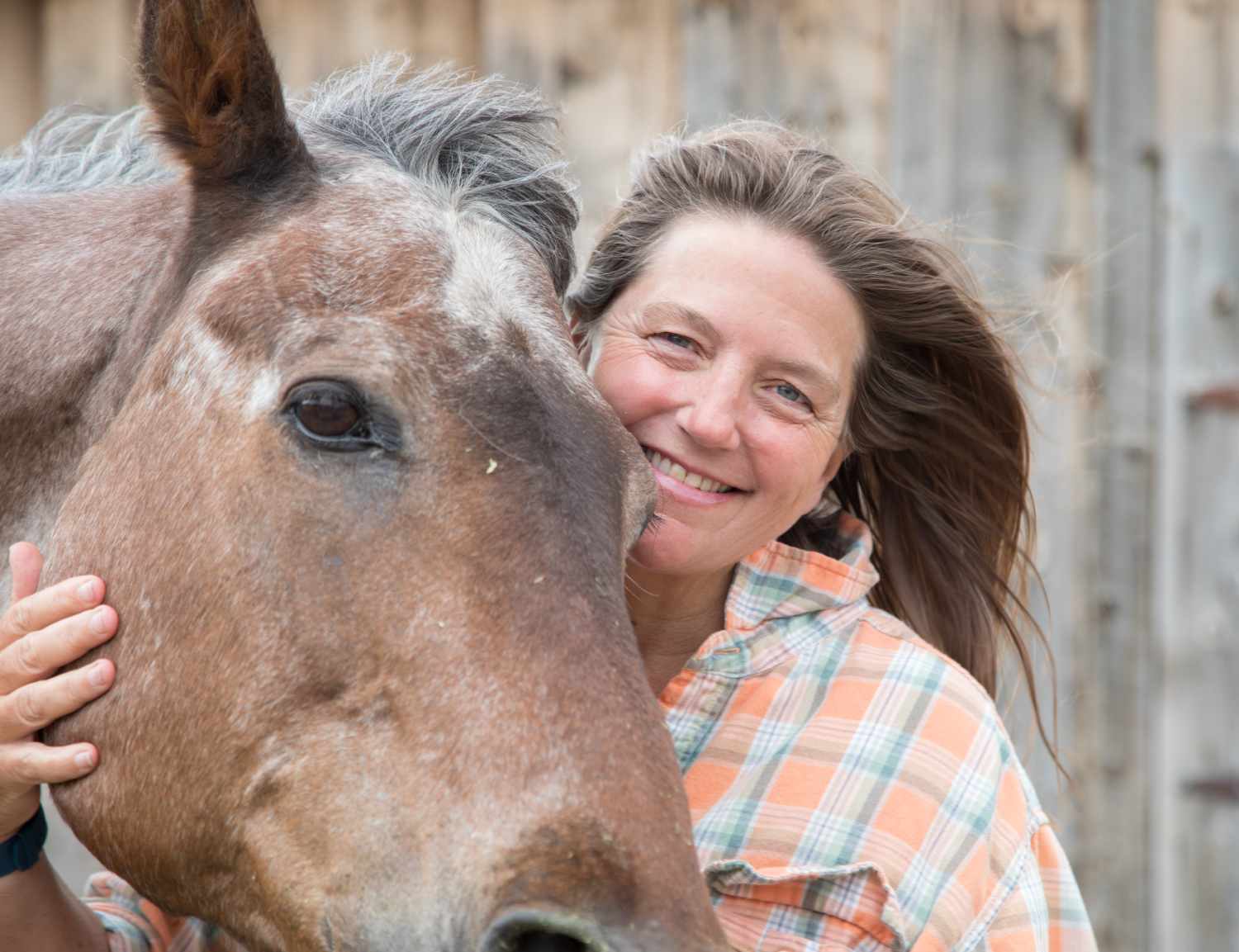 Author Pam Houston with a horse