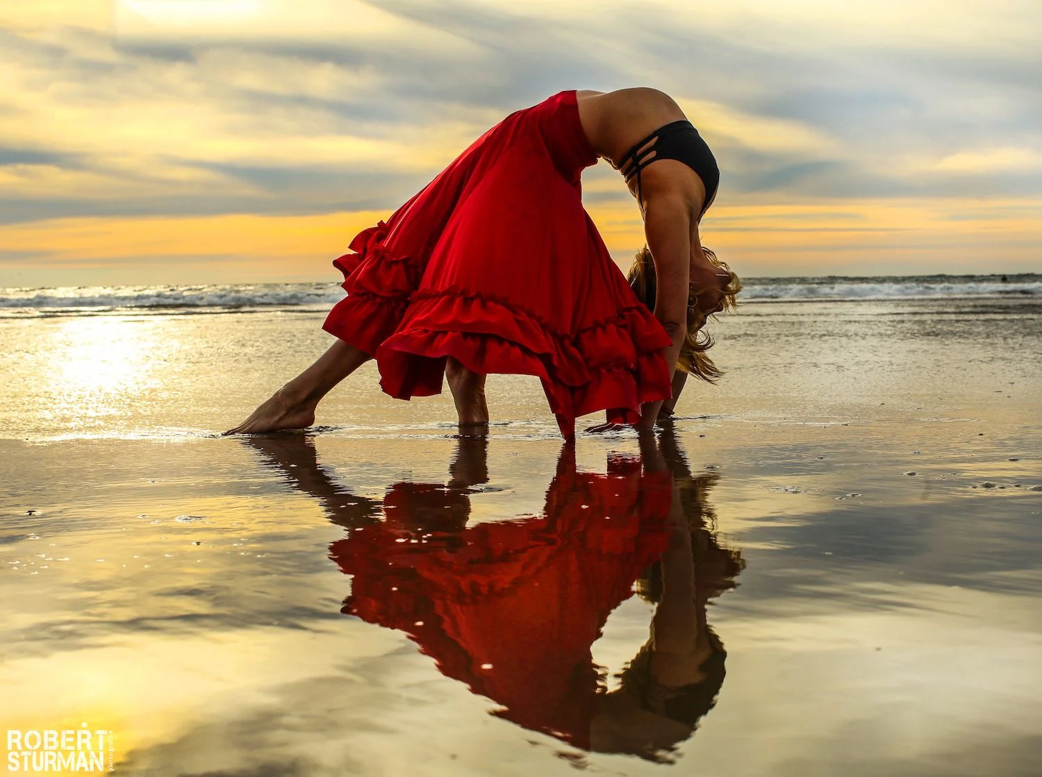 Woman doing yoga on the water, photo by Robert Sturman