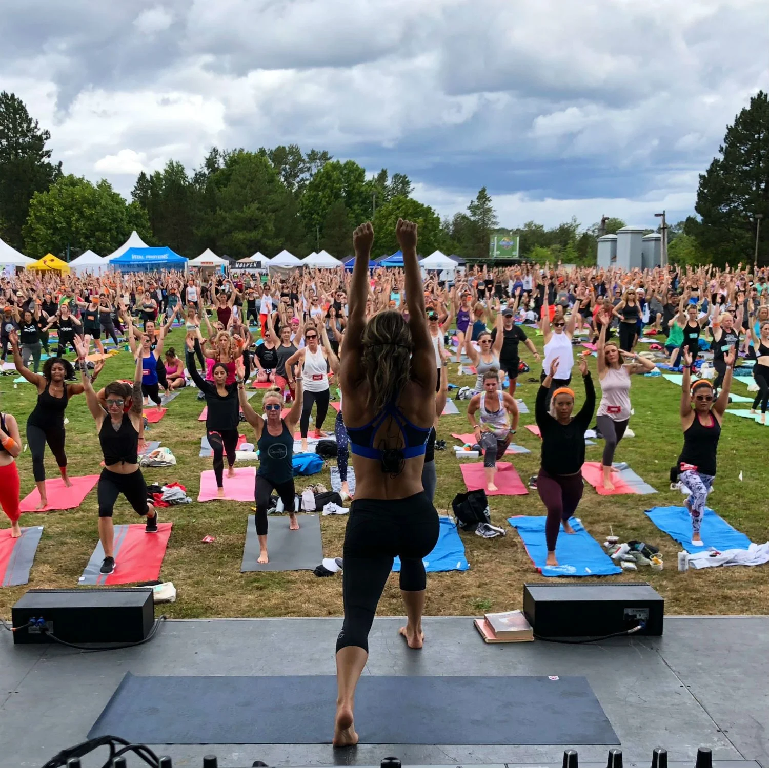 Chelsey Korus leading group yoga outdoors