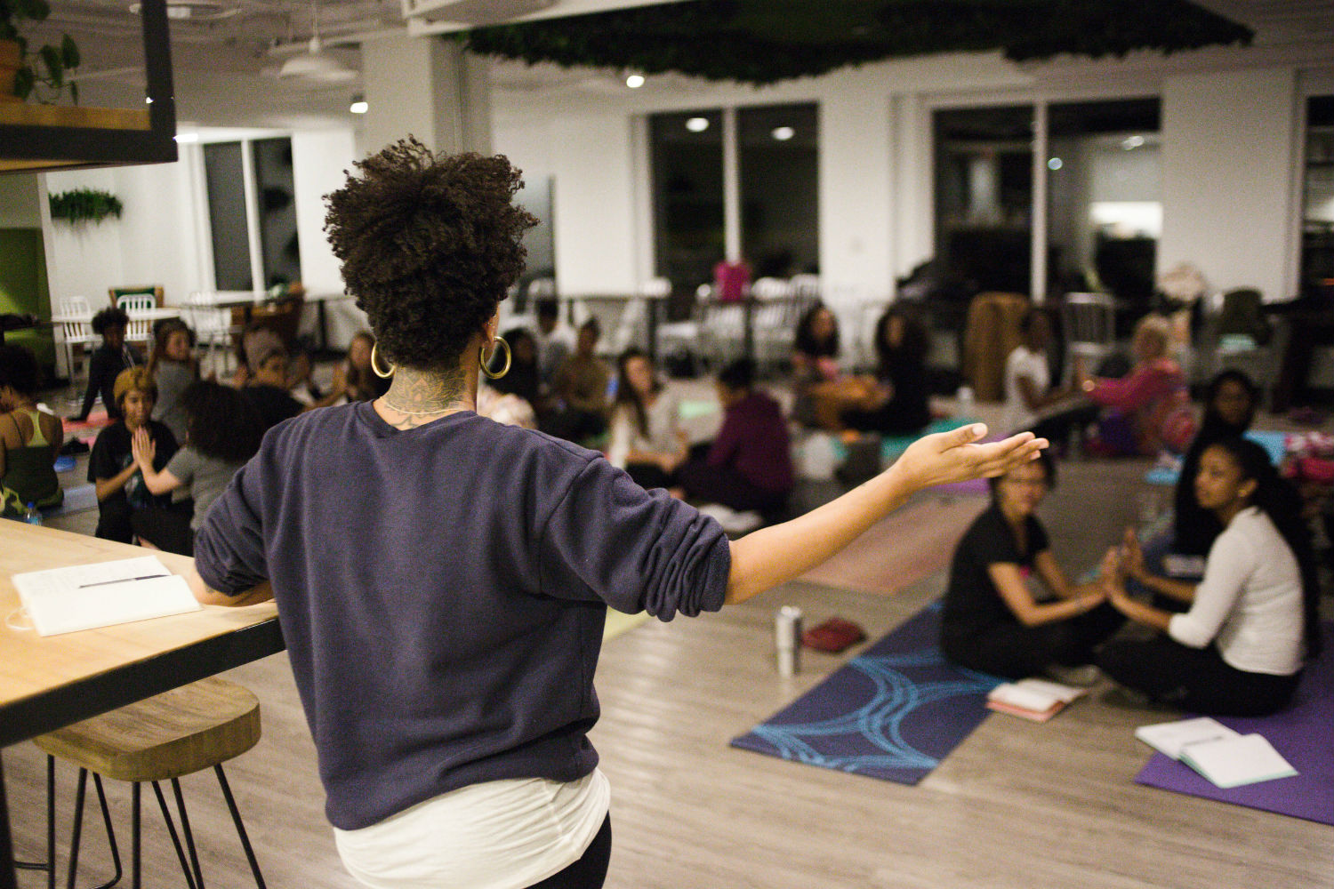Alex Elle teaching a writing workshop