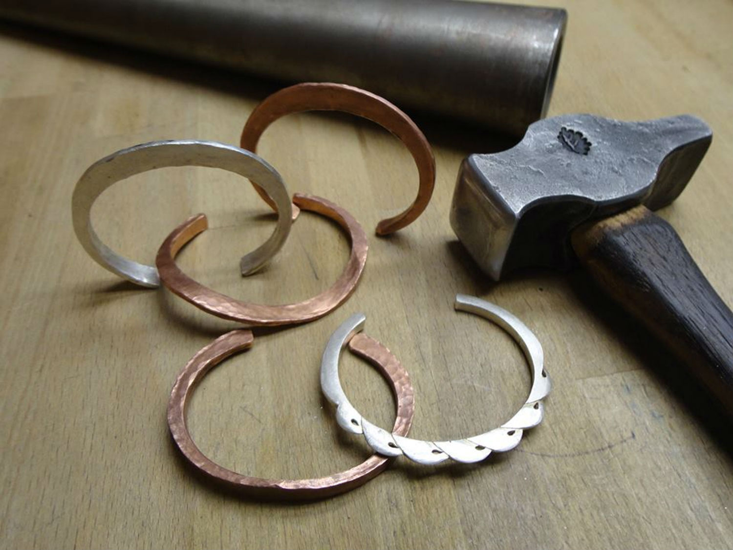 Forged bracelets by Michael Sturlin