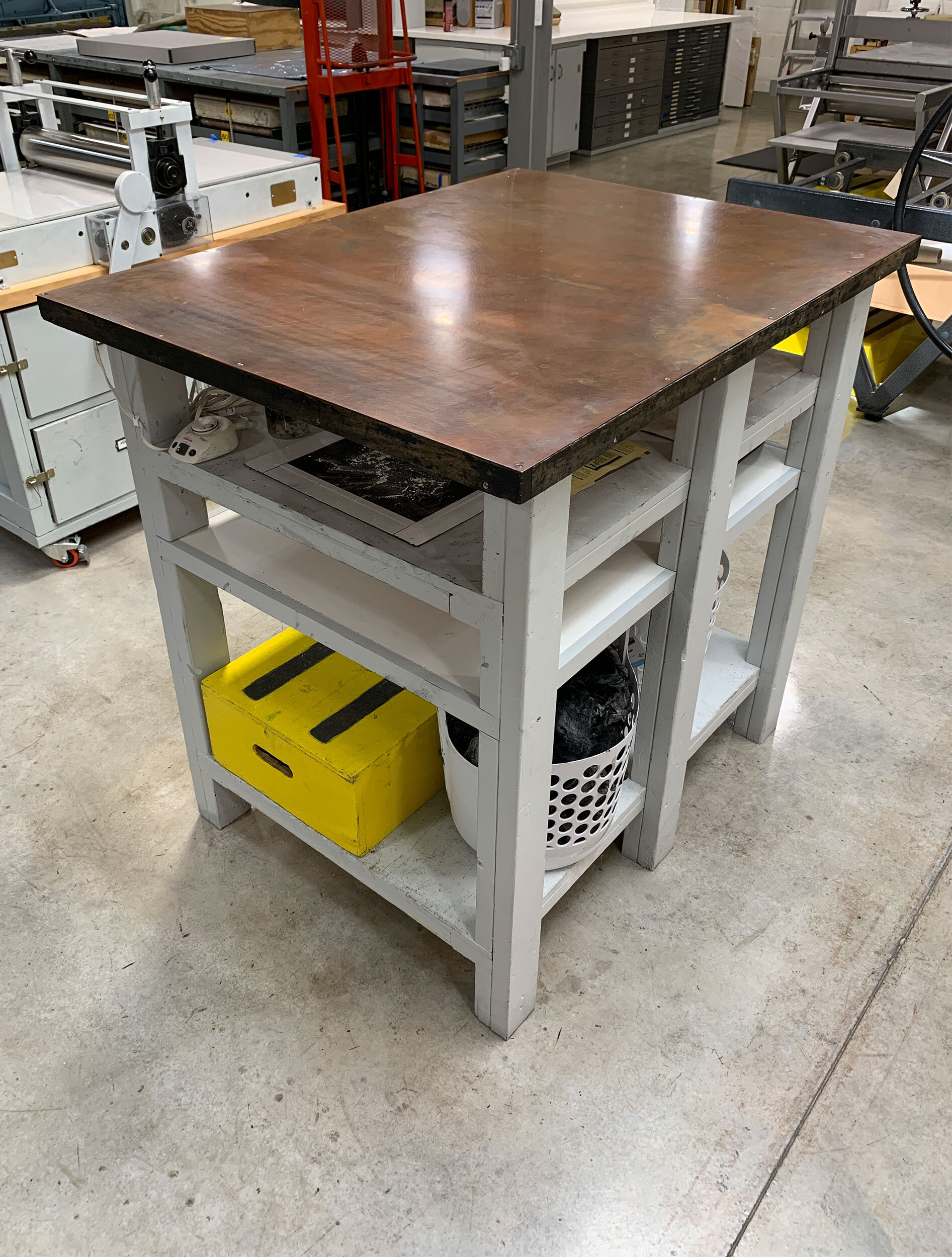 Heated plate wiping station