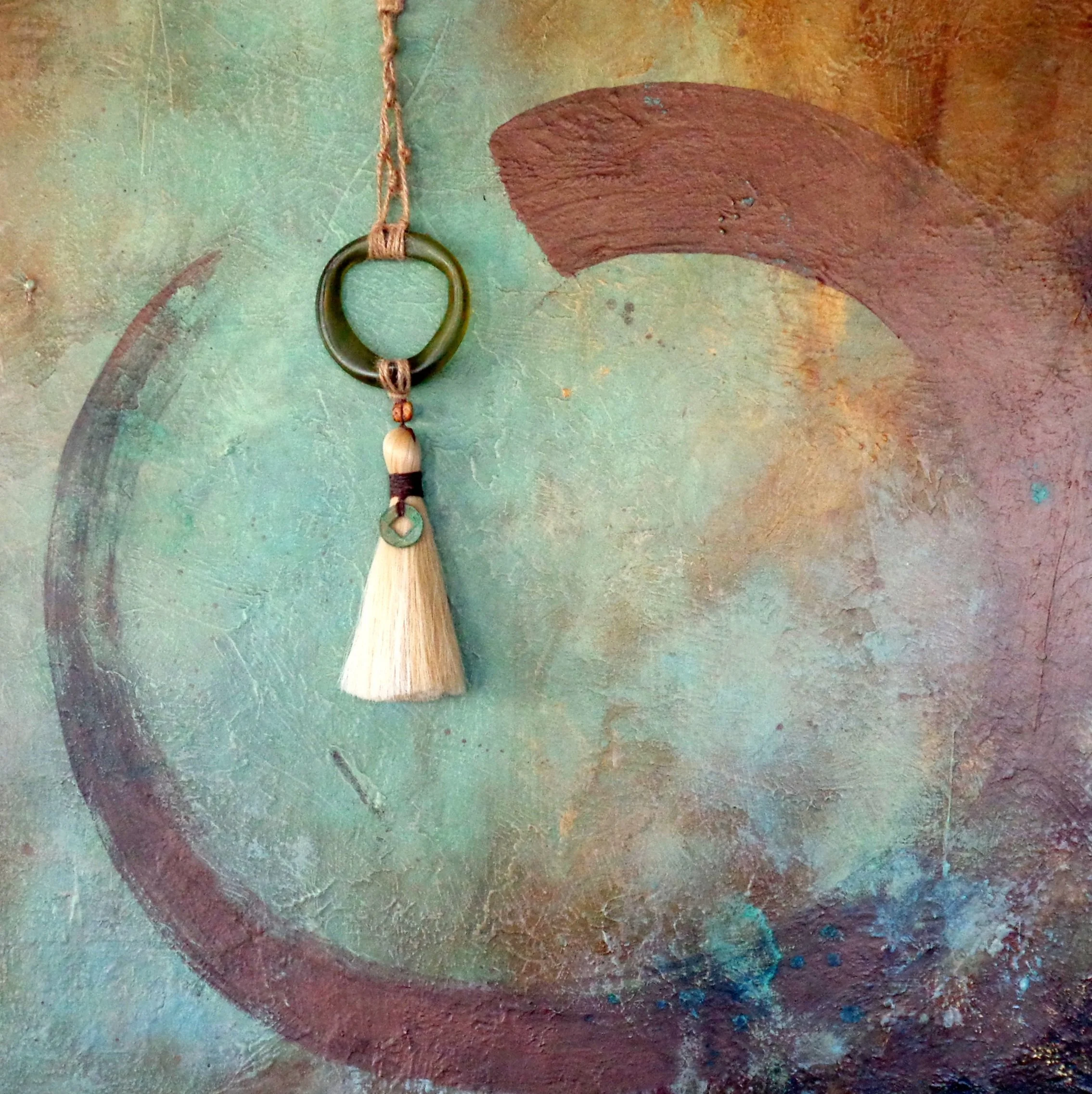 Holding+Space%2C+24x24+acrylic+and+mixed+media+with+recycled+glass%2C+jute%2C+handmade+horsehair+tassel.jpg